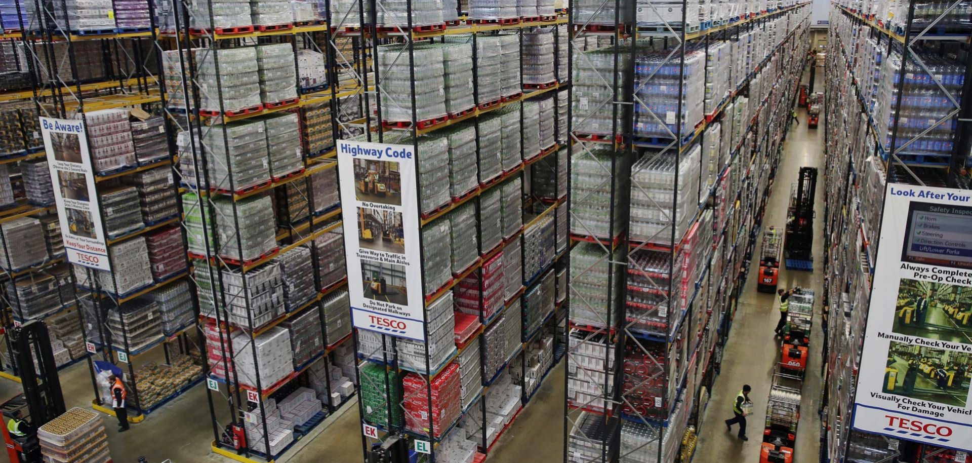 A Tesco distribution plant in December 2014 in Reading, England. In the lead up to Christmas, Tesco's busiest time of the year, 13,000 staff worked around the clock at 28 distribution centers across the United Kingdom.