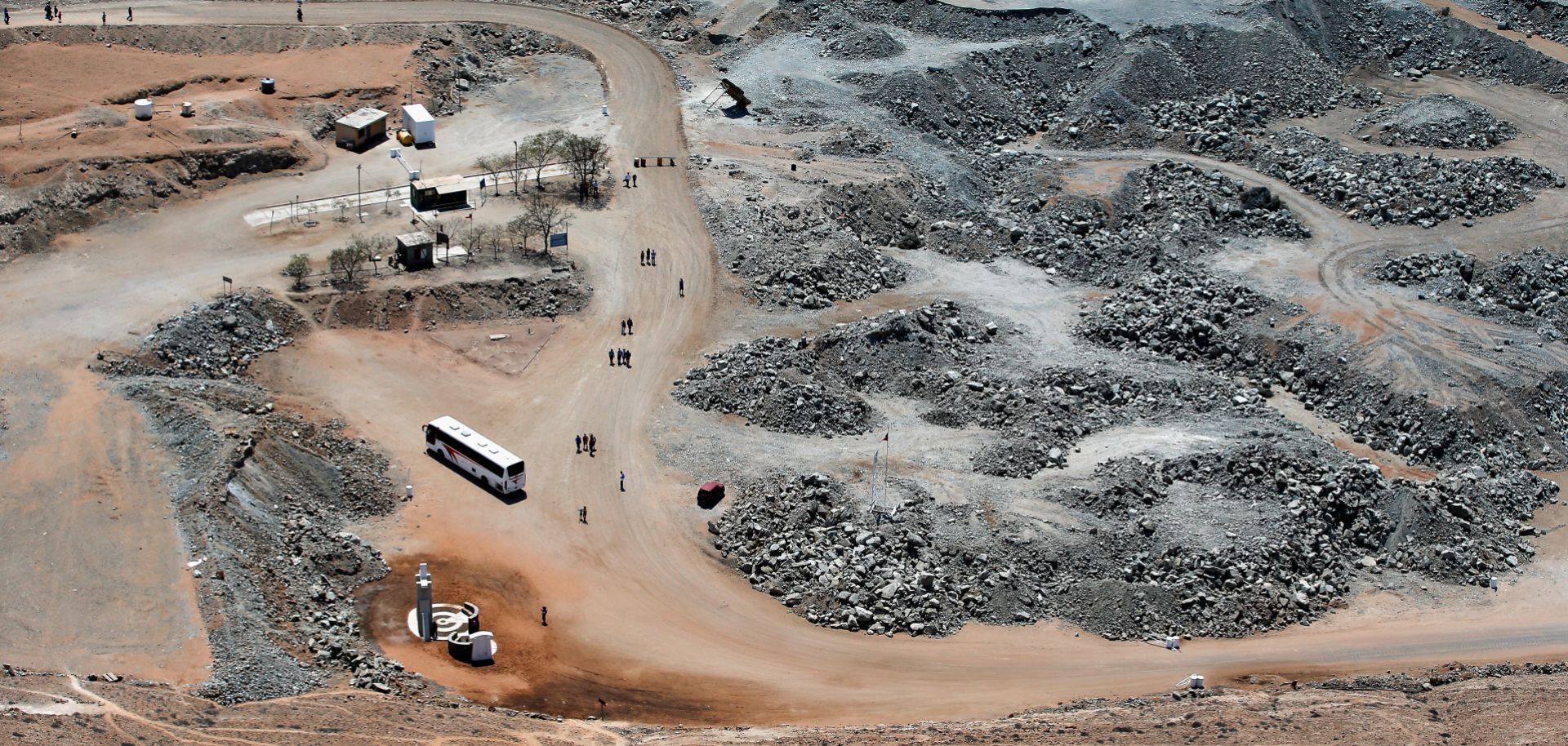 A general aerial view as tourists on a bus visit the site famous for the Chilean mining accident in 2010, on January 17, 2014 in Copiapo, Chile. 