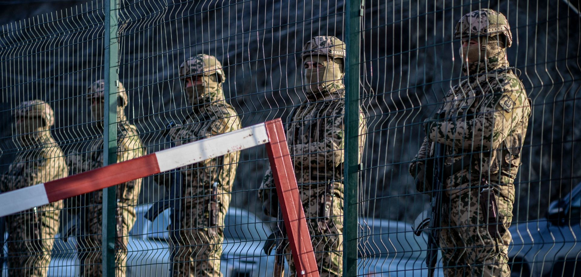 Azeri soldiers stand guard at a checkpoint at the Lachin corridor, the disputed Nagorno-Karabakh region's only land link with Armenia, on Dec. 27, 2022. 