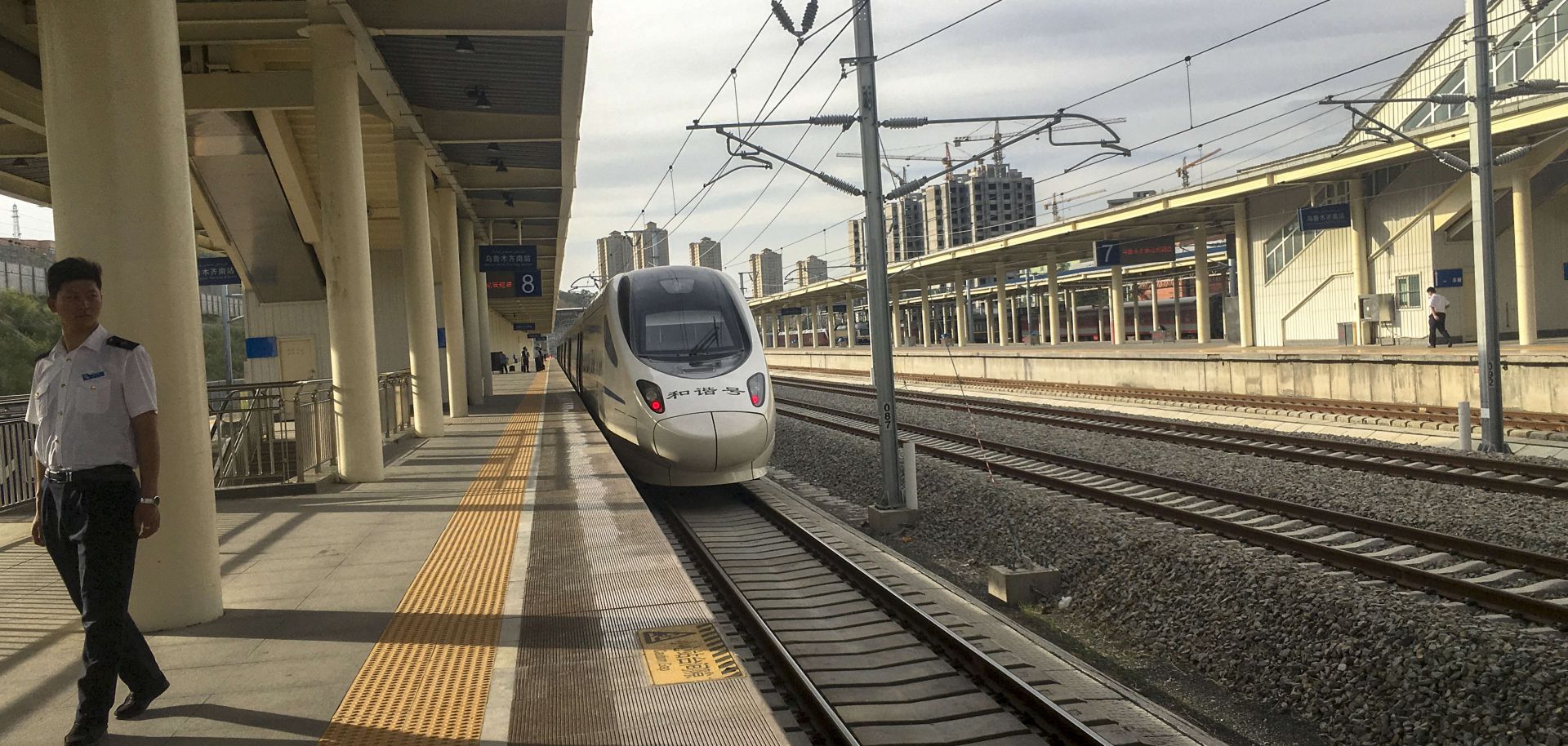 A CRH train drives into Urumqi south railway station.