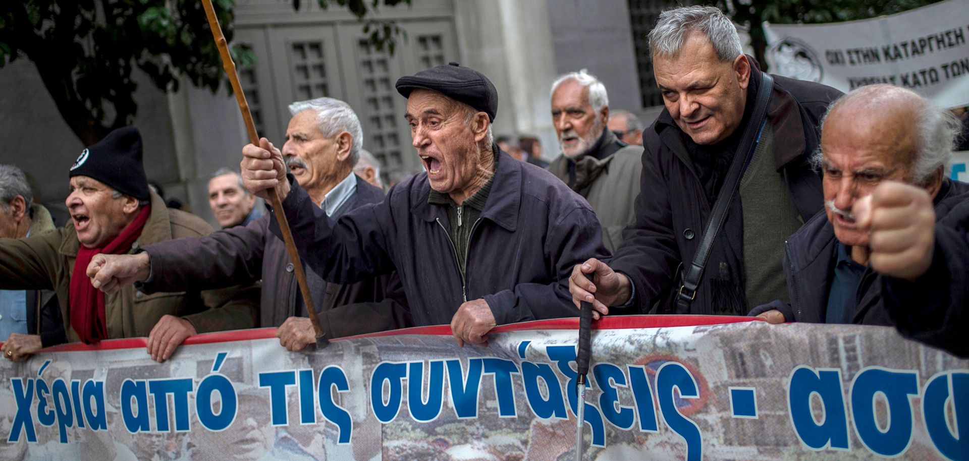 Pensioners march in central Athens on Dec. 15, 2018, during a demonstration to demand the return of pension funds lost as part of austerity measures. 