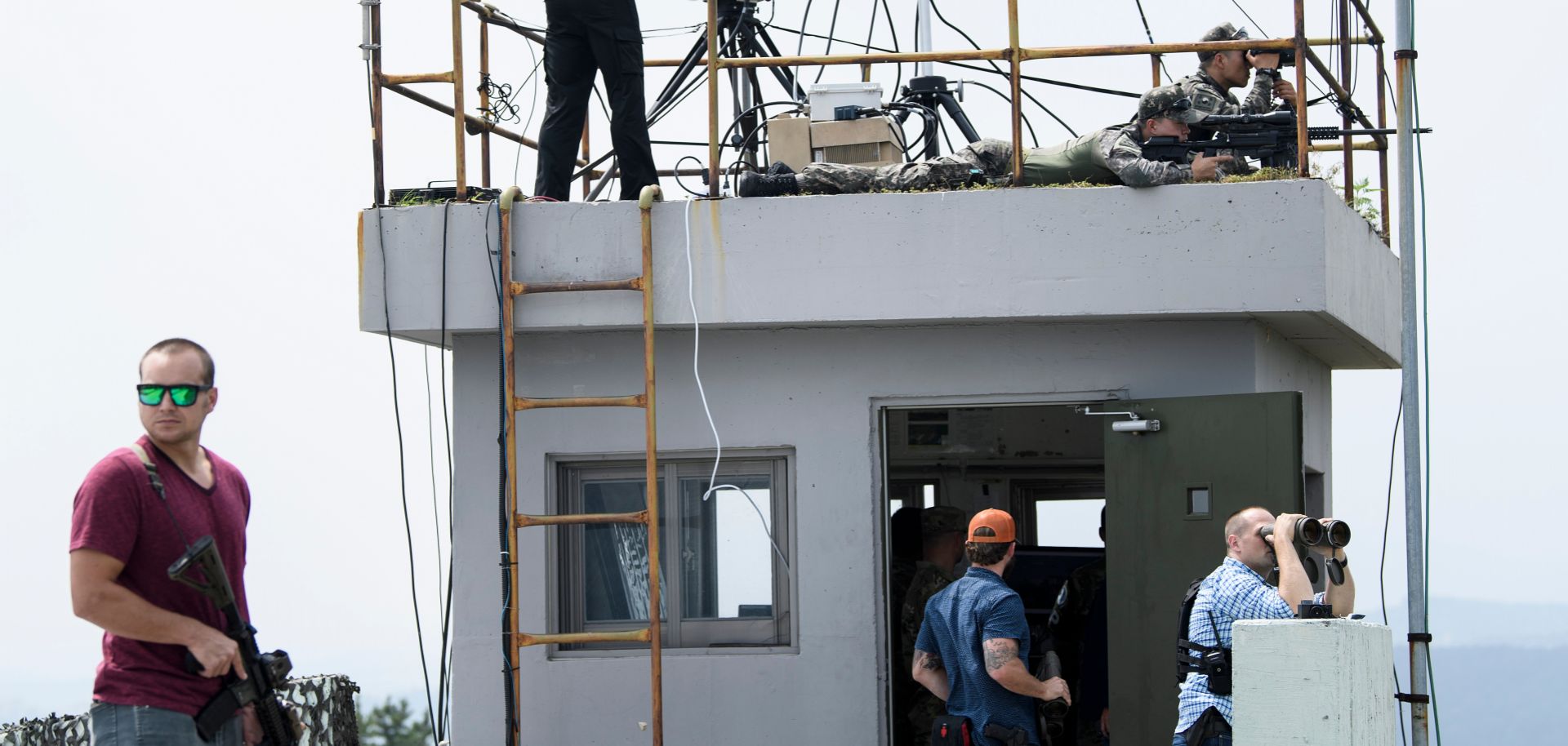 Security agents stand guard while the U.S. president visits an observation post in the Demilitarized Zone in 2019 in Panmunjom, North Korea.