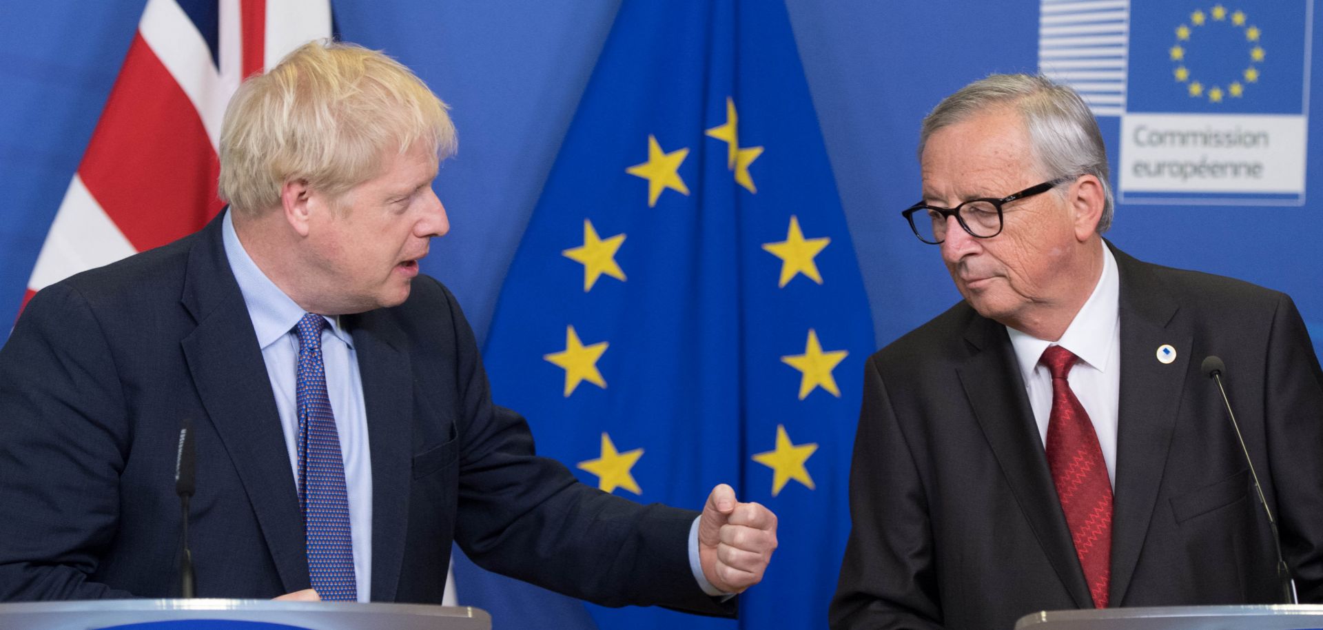British Prime Minister Boris Johnson (L) and European Commission President Jean-Claude Juncker converse ahead of the European Council summit in Brussels on Oct. 17, 2019.