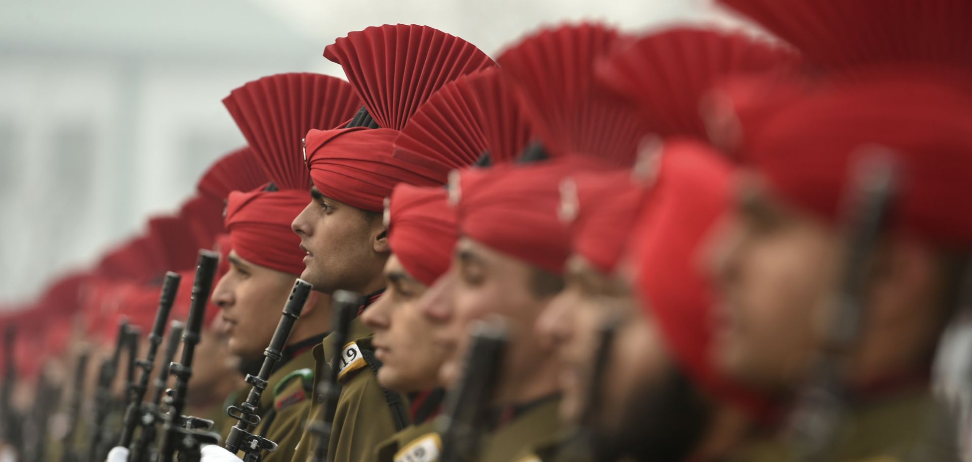 Newly recruited Indian army soldiers from the Jammu and Kashmir Light Infantry (JAKLI) stand in formation during a passing out parade at JAKLI army headquarters in Srinagar on Dec. 7, 2019.