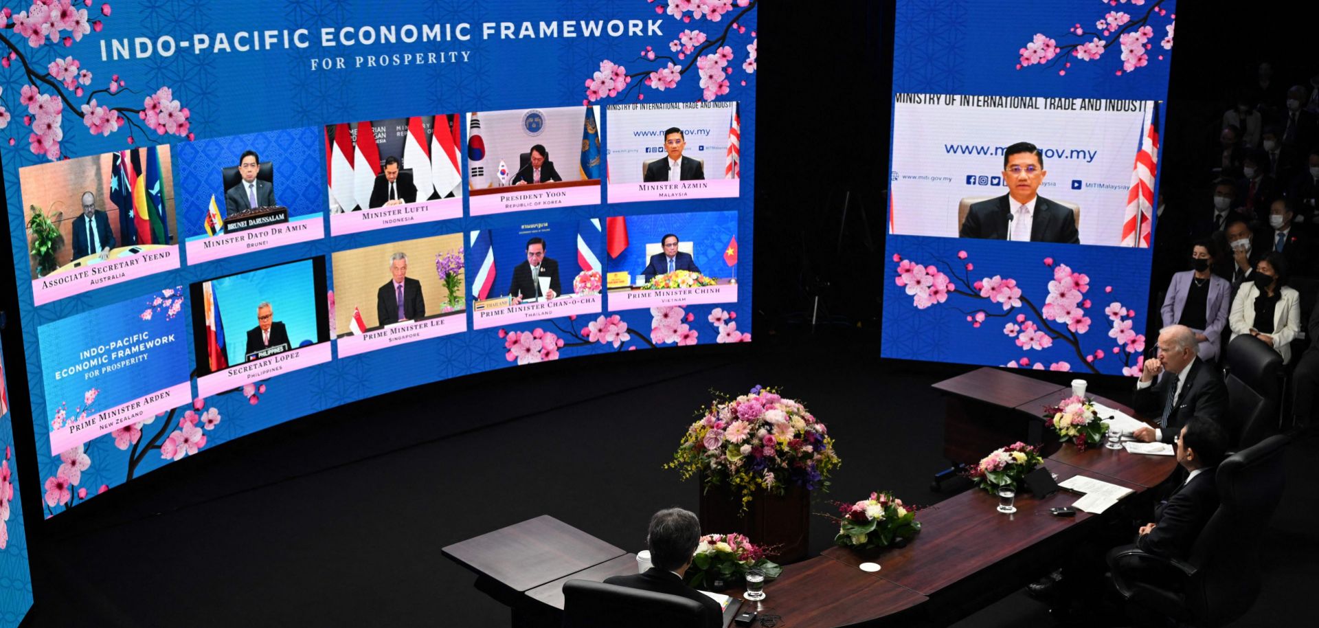 A photo taken on May 23, 2022, in Tokyo shows U.S. President Joe Biden and Japanese Prime Minister Fumio Kishida attending a video call with leaders from countries in the Indo-Pacific Economic Framework for Prosperity. 