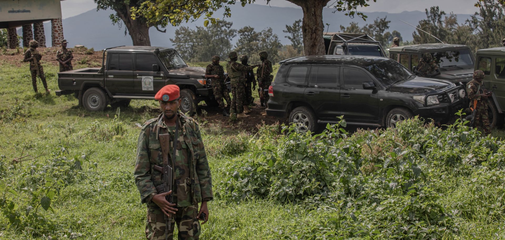 M23 fighters guard the area during a meeting between the rebel group and East African Regional Force (EACRF) officials at the Rumangabo camp in eastern Democratic Republic of Congo on Jan. 6, 2023.