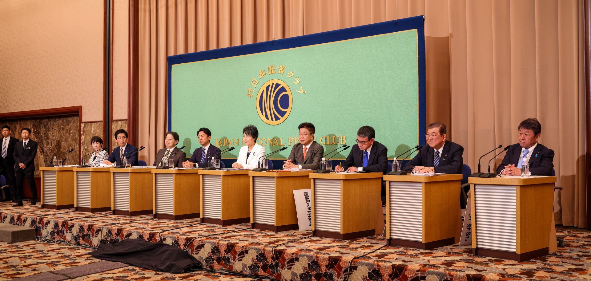 The candidates for Japan's ruling Liberal Democratic Party's (LDP) leadership election sit on stage during a debate in Tokyo on Sept. 14, 2024.