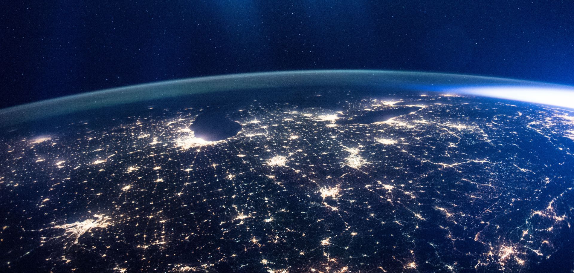 The glittering lights of the American Midwest illuminate the Earth in this captivating image taken by the International Space Station Expedition 46 crew on Jan. 5, 2016. The picture, which was taken while the station was flying above Alabama, shows numerous major cities, including the major city of Chicago (middle-left) situated on the Lake Michigan coastline. Also in view are three of the American Great Lakes, including Lake Michigan (left), Lake Huron (middle) and Lake Erie (right).