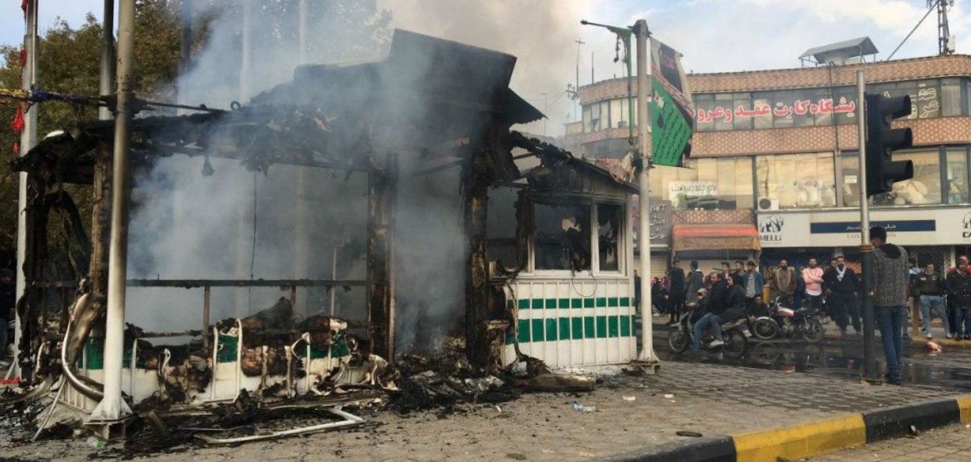 This photo shows a smoldering police station in Isfahan, Iran, the result of violent protests against fuel price increases.