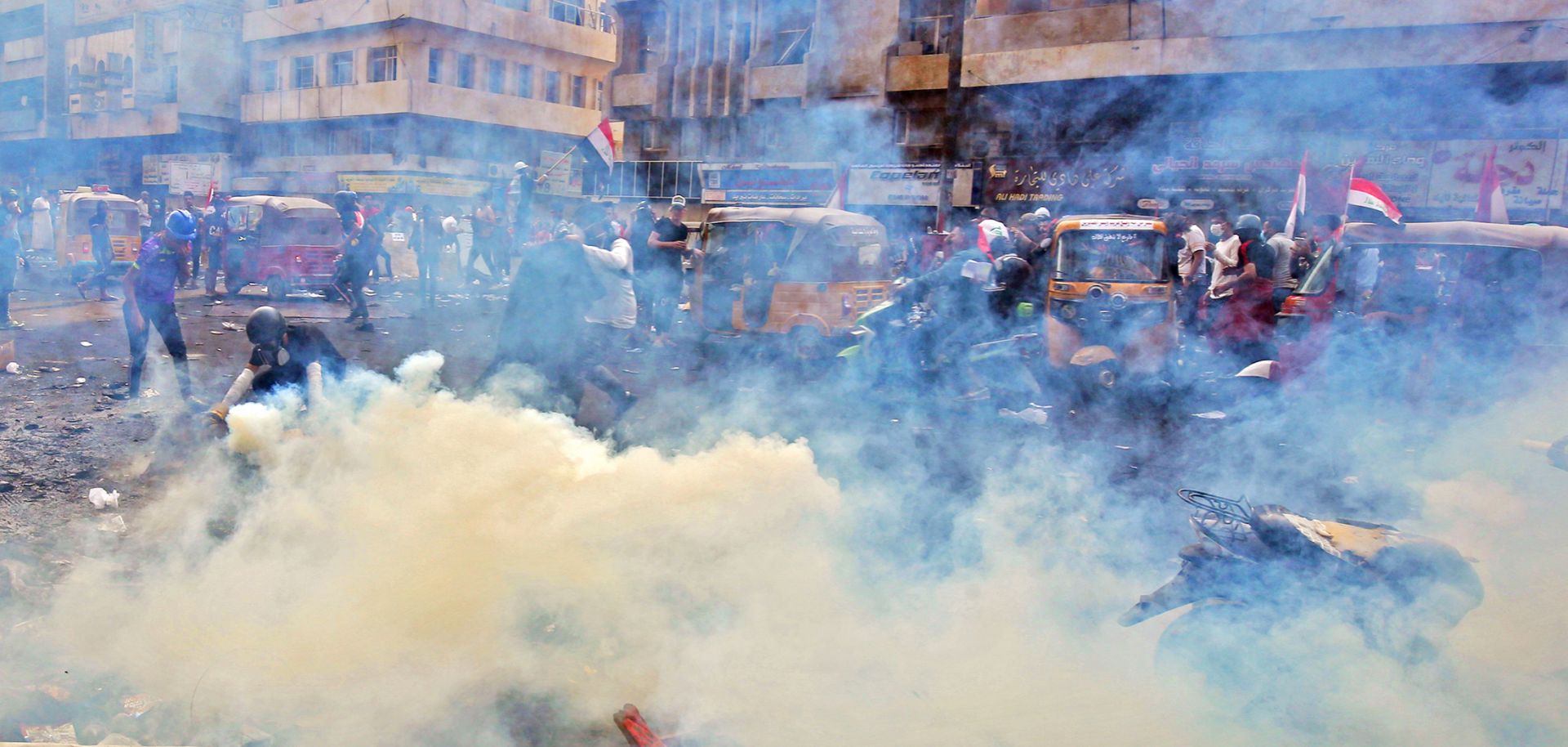 This photo shows clouds of tear gas rising over a protest in Baghdad on Nov. 14, 2019.