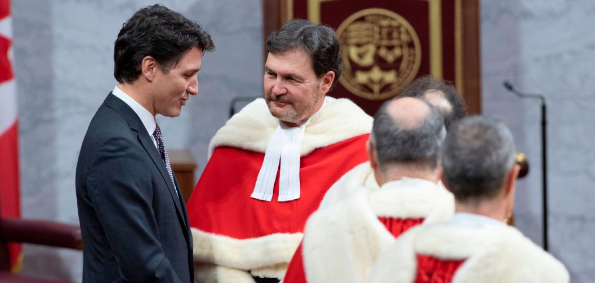 Canadian Prime Minister Justin Trudeau (L) and other officials wait for a Throne Speech on Dec. 5, 2019, at the Senate in the Canadian capital of Ottawa.