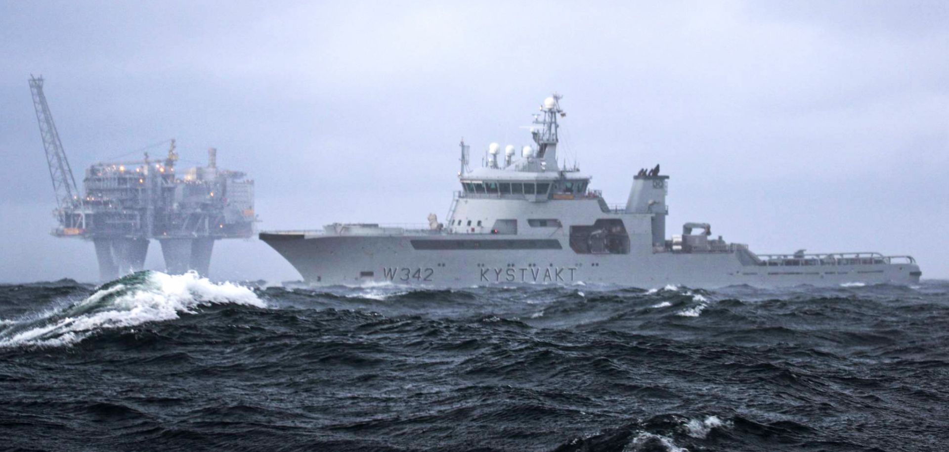 A Norweigan coast guard ship patrols the waters surrounding an  offshore gas platform in the Troll gas field off the west coast of Norway.