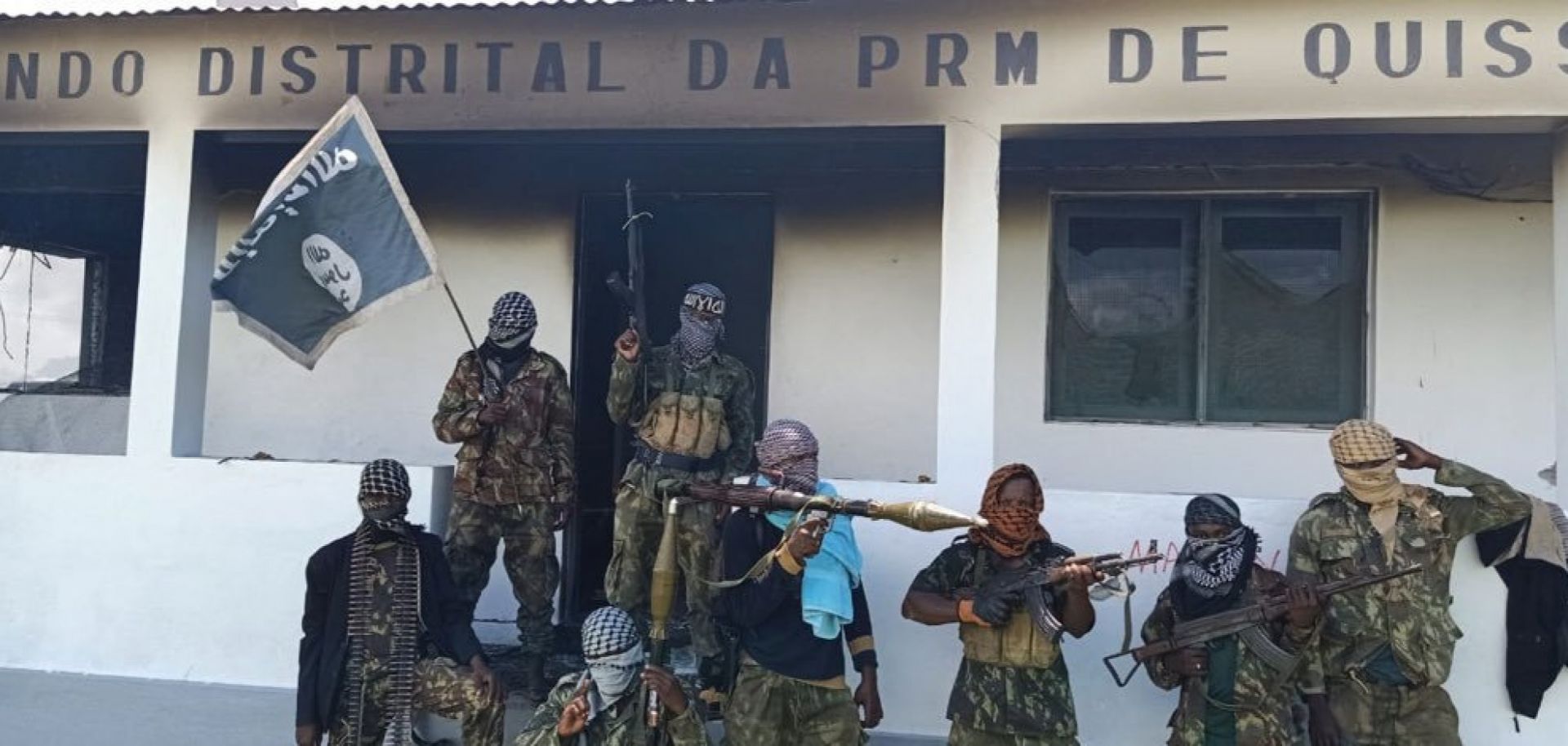 A member of ISCAP is seen holding a so-called Prophet's Banner on March 24 in Quissanga, Mozambique.