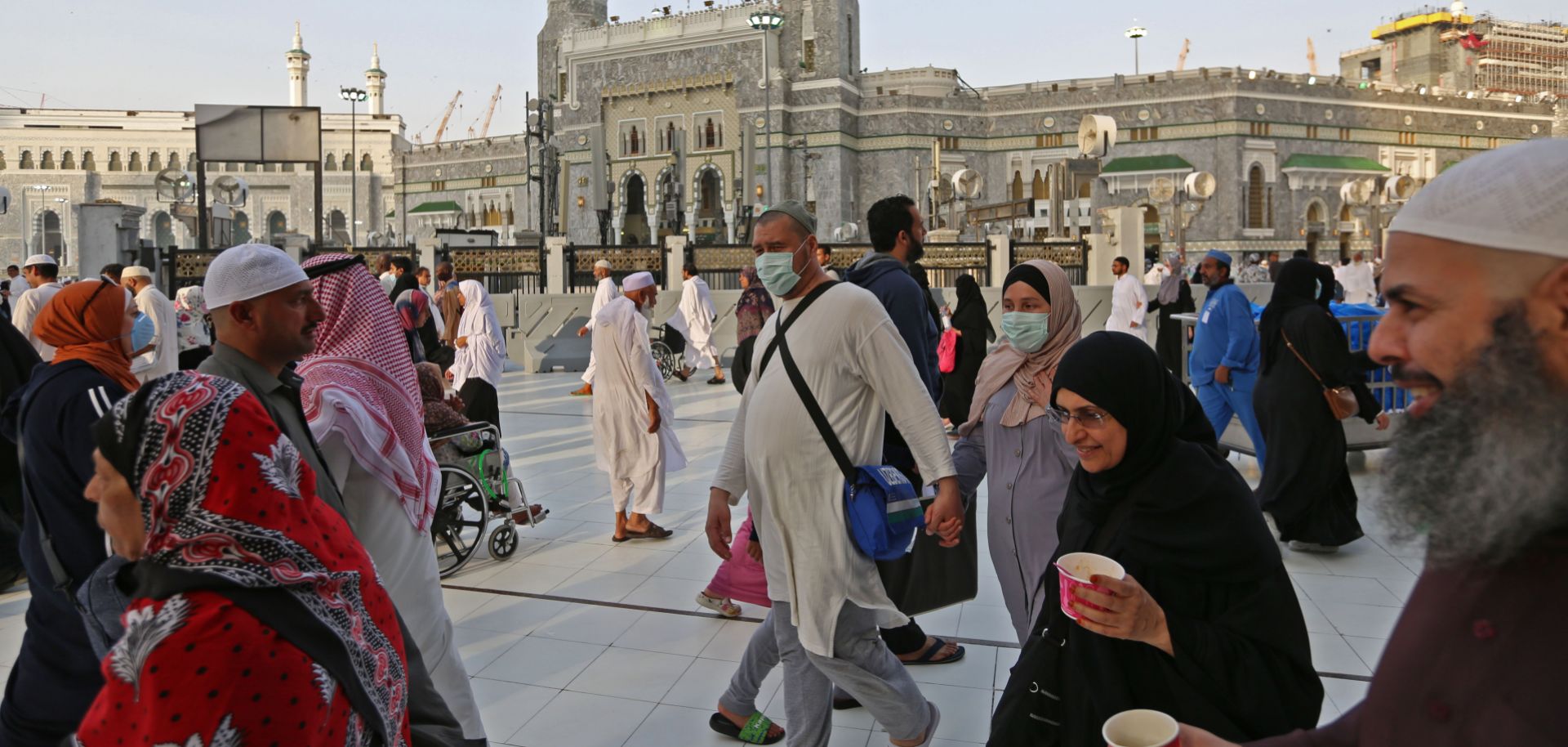 Muslim pilgrims wear masks at the Grand Mosque in Saudi Arabia's holy city of Mecca on Feb. 28, 2020.