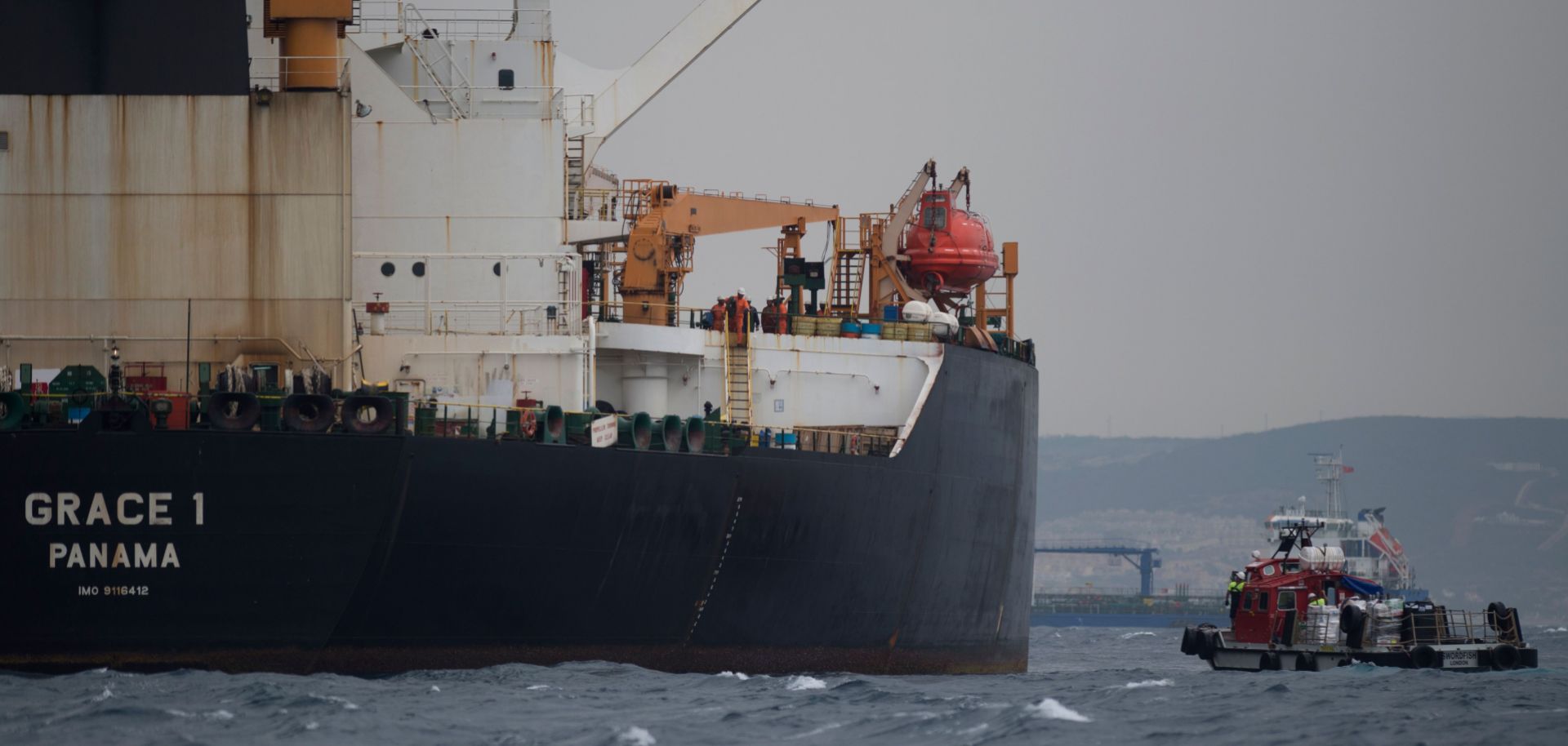 A ship approaches supertanker Grace 1 off the coast of Gibraltar on July 6, 2019.