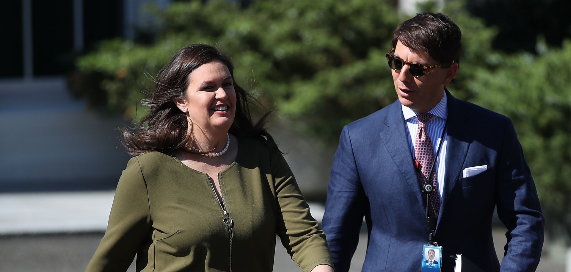 White House Press Secretary Sarah Sanders walks with Deputy Press Secretary Hogan Gidley following a press conference on May 31, 2019.