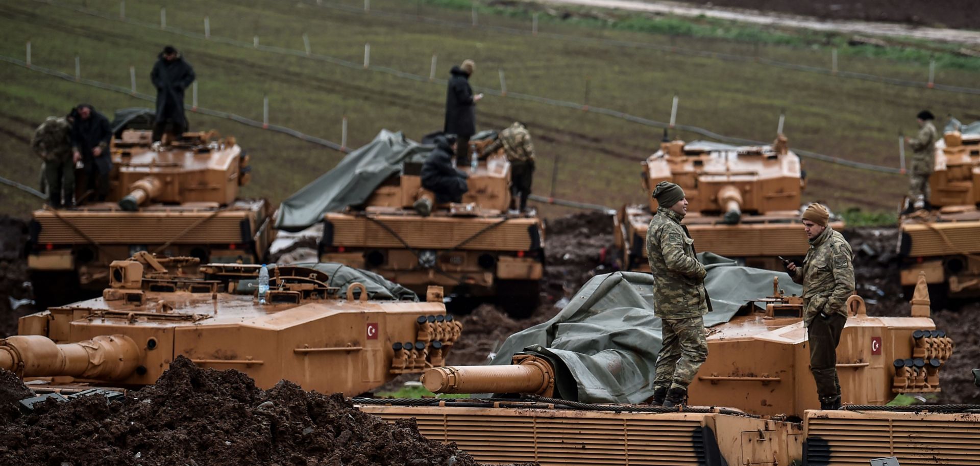 Turkish tanks and troops wait along the Syrian border Jan. 25, 2018, during Operation Olive Branch, an incursion into Afrin canton.