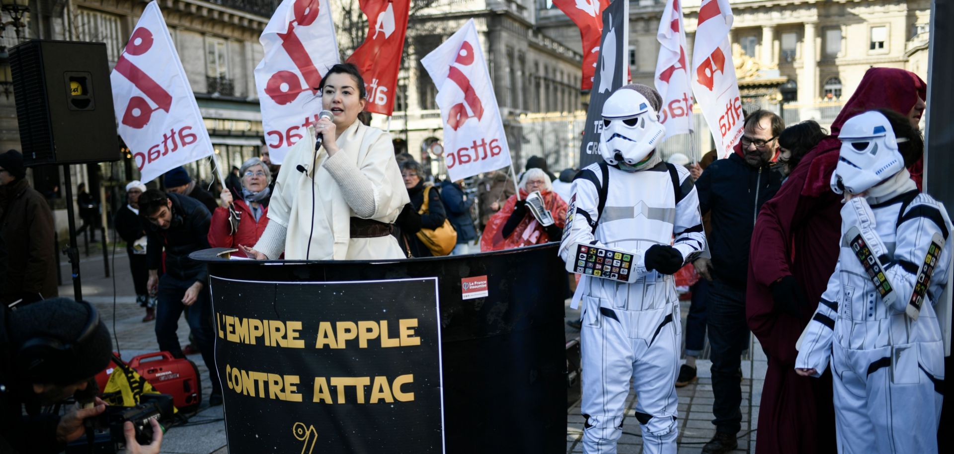 Members of the French activist group Attac rally in Paris on Feb. 12, 2018, against Apple Inc., which they accuse of tax evasion.