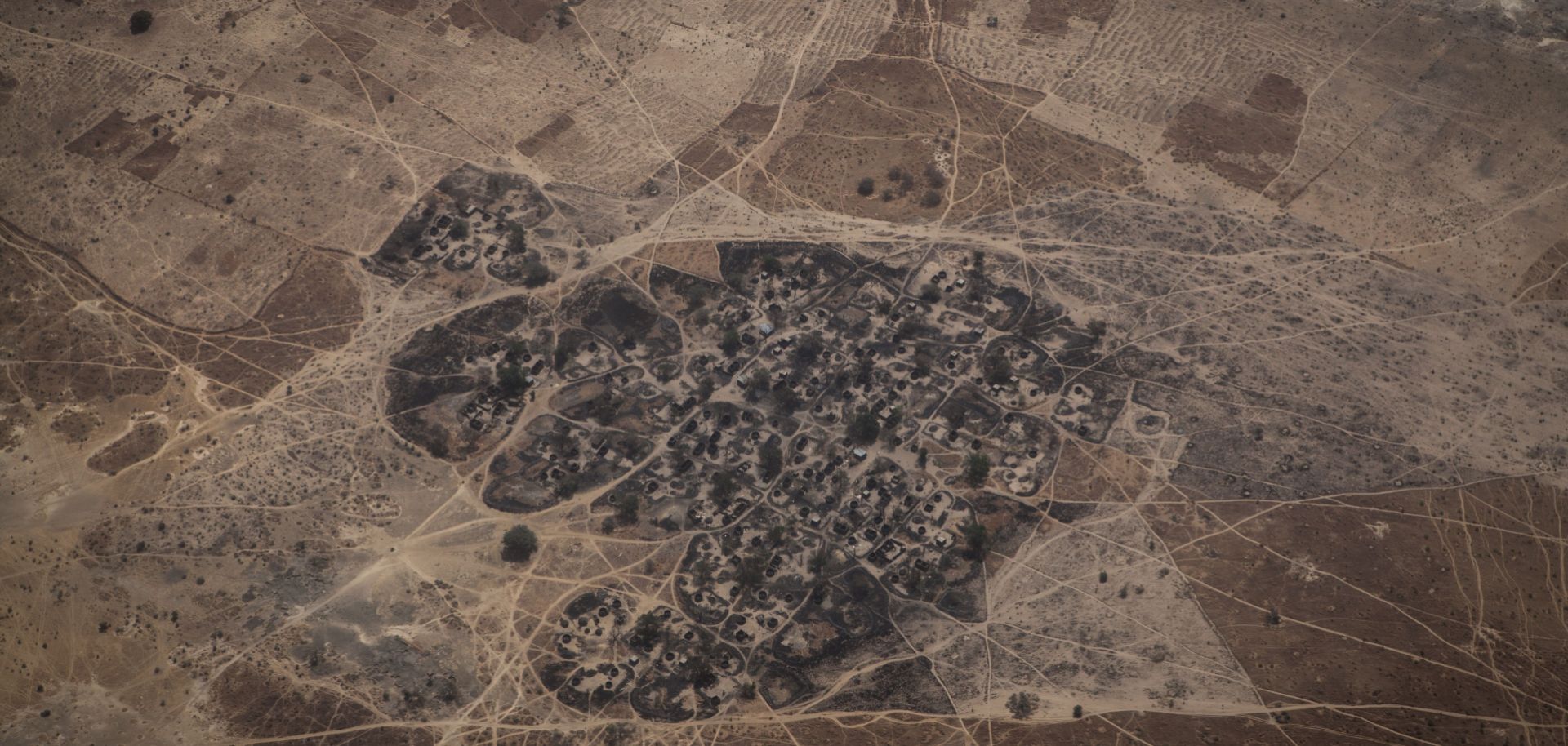 An aerial photograph from February 2017 shows a burnt village, believed to have been attacked by Boko Haram, in northeast Nigeria.