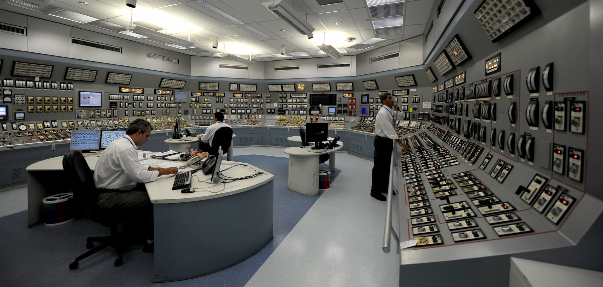 Specialists monitor dials in the control room of the Angra 1 nuclear plant in Angra dos Reis in Brazil's Rio de Janeiro state on April 12, 2011. 