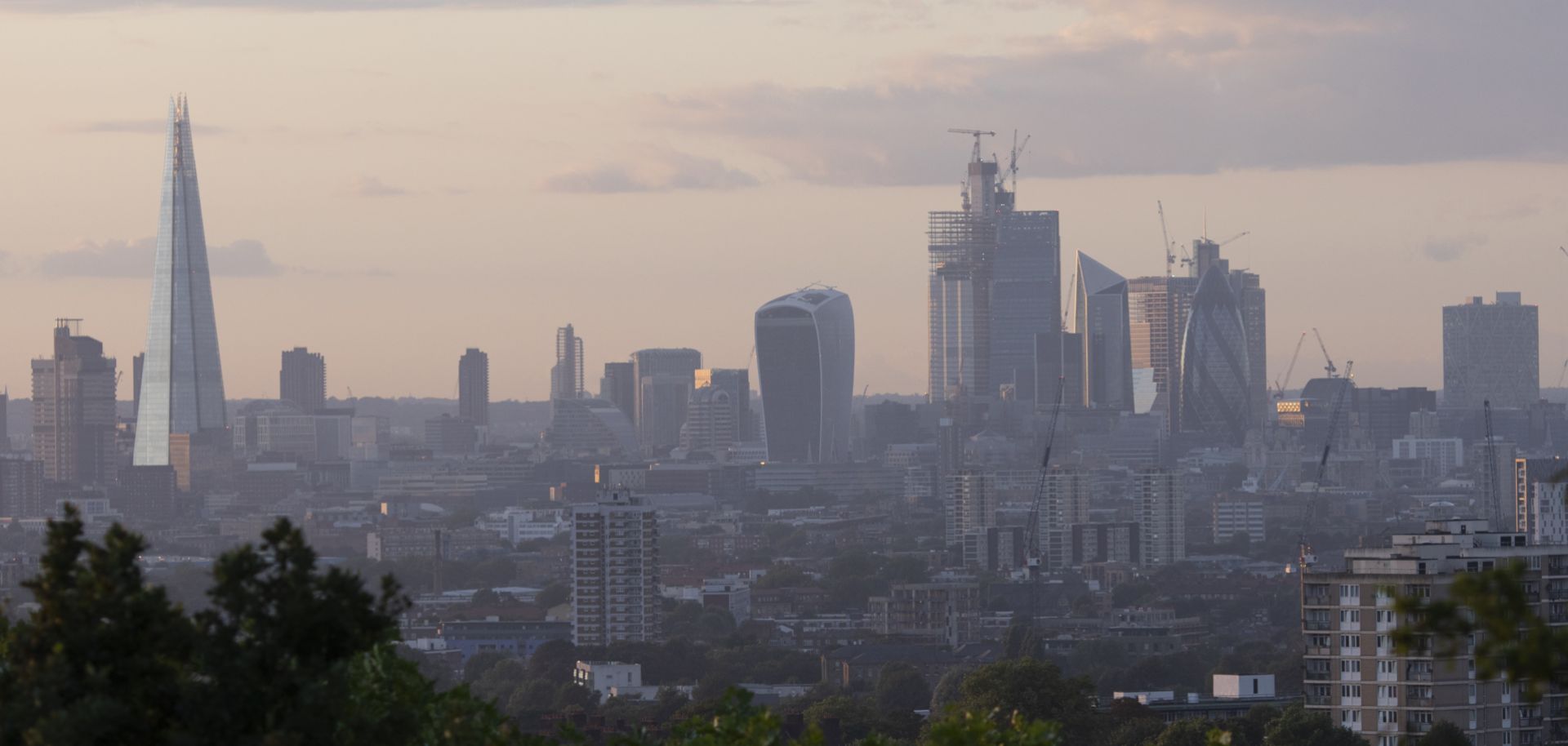 The skyline in London is all aglow as the sun sets on Aug. 16, 2018.