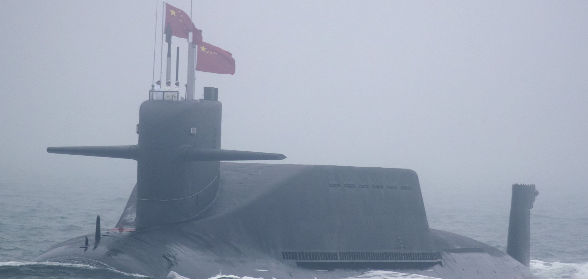 A new type 094A Jin-class nuclear submarine of the Chinese People's Liberation Army Navy participates in a naval parade to commemorate the 70th anniversary of the founding of China's PLA Navy in the sea near Qingdao, in eastern China's Shandong province on April 23.