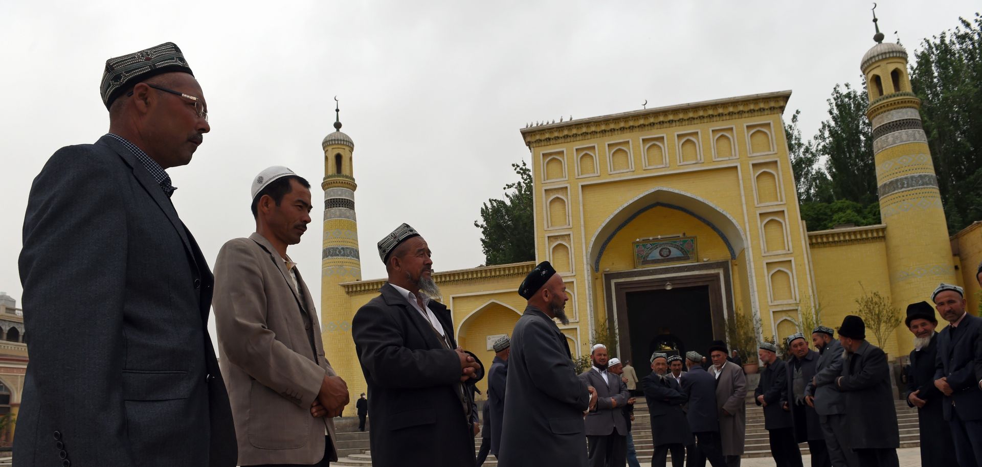 This April 19, 2015, photo shows Uighur men gathering for afternoon prayers at the Id Kah Mosque in Kashgar, Xinjiang. China's crackdown on Uighur Muslims in Xinjiang could result in U.S. sanctions.