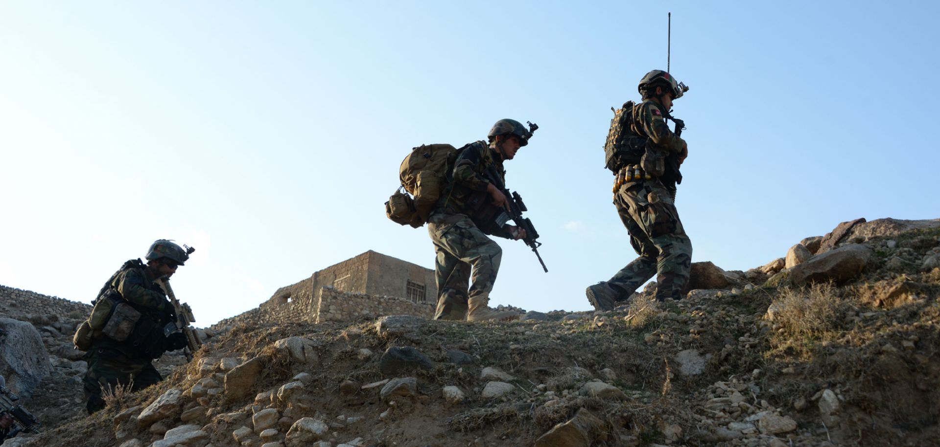 Afghan commandos patrol the Achin district of Nangarhar province during a U.S.-Afghan military operation against Islamic State militants on Jan. 3, 2018.