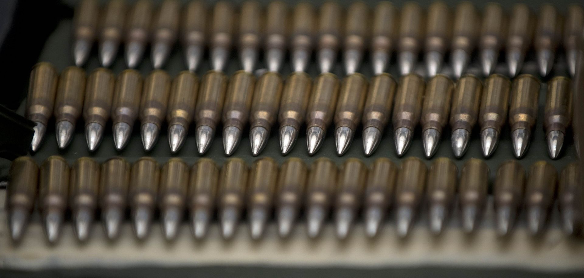 Officials display rifle ammunition seized from the Los Zetas drug cartel in June 2011.