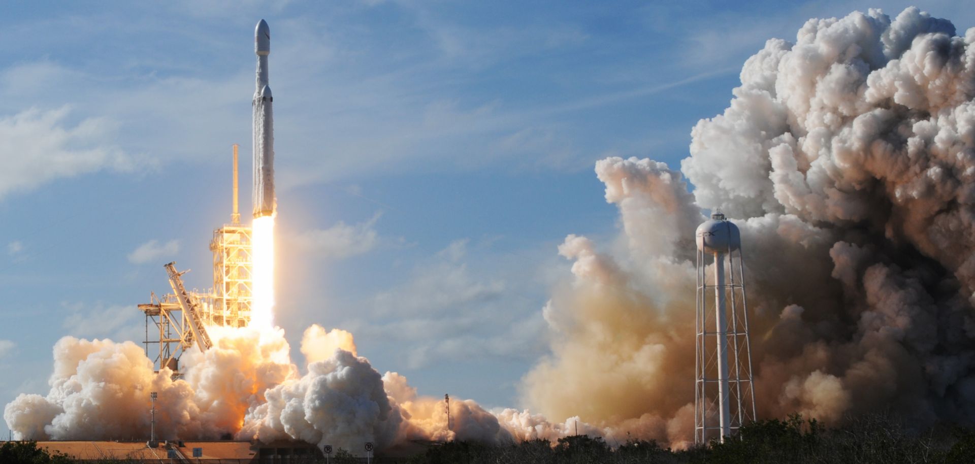 The Falcon Heavy, a fully reusable rocket from SpaceX, takes off from a launchpad at the Kennedy Space Center on Feb. 6, 2018.