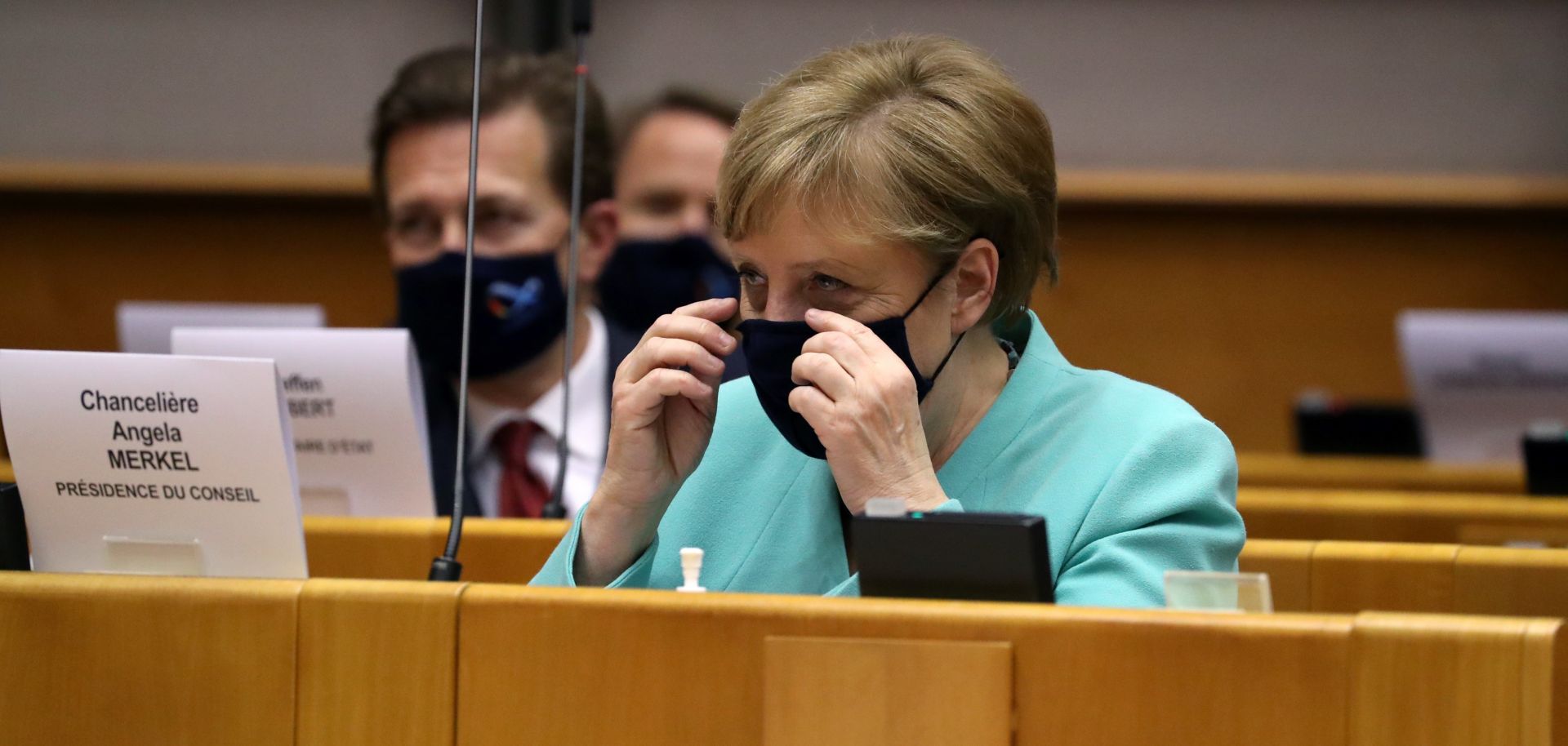 German Chancellor Angela Merkel wears a protective face mask as she attends a plenary session at the European Parliament in Brussels, Belgium, on July 8, 2020.