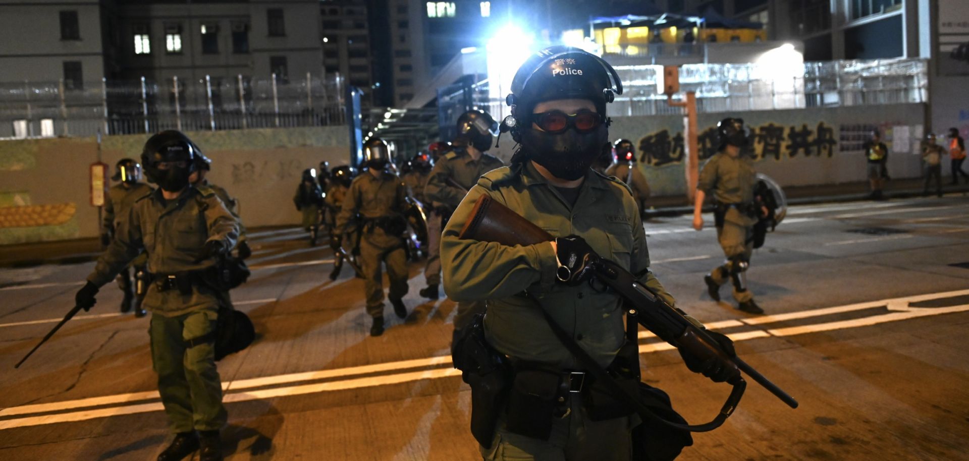 This photo shows riot police in Hong Kong standing guard outside a police station on Oct. 7, 2019.