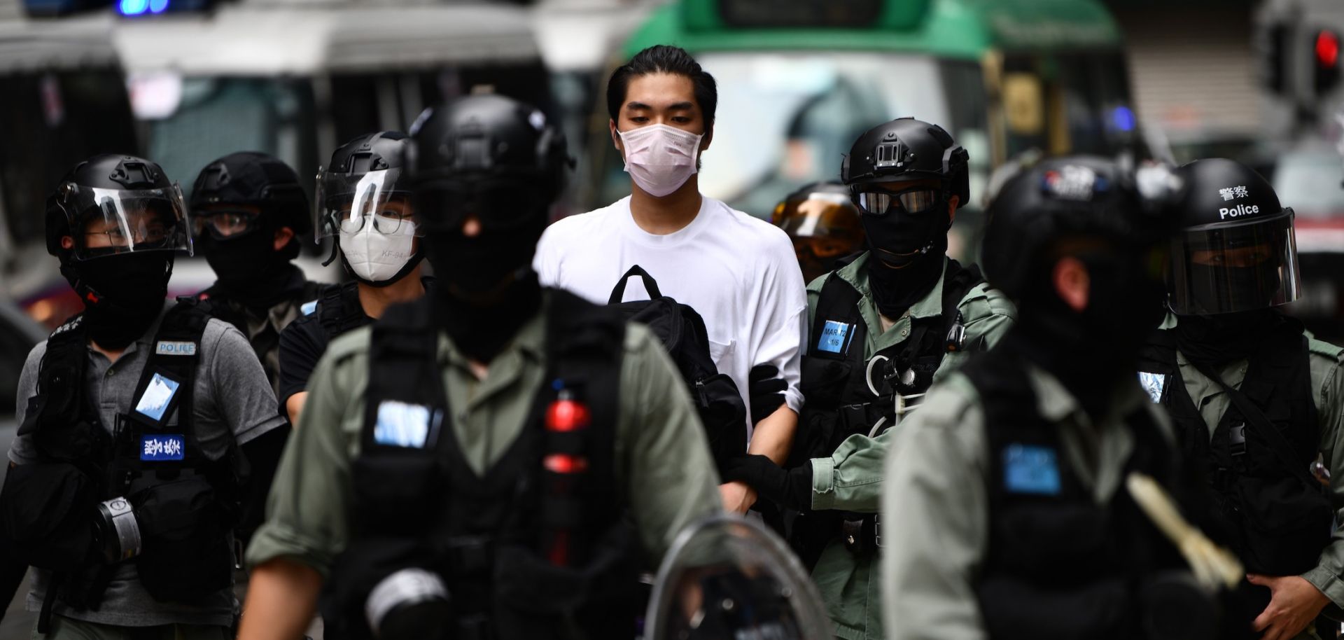 A man is detained by riot police in downtown Hong Kong during a pro-democracy demonstration on May 27, 2020.