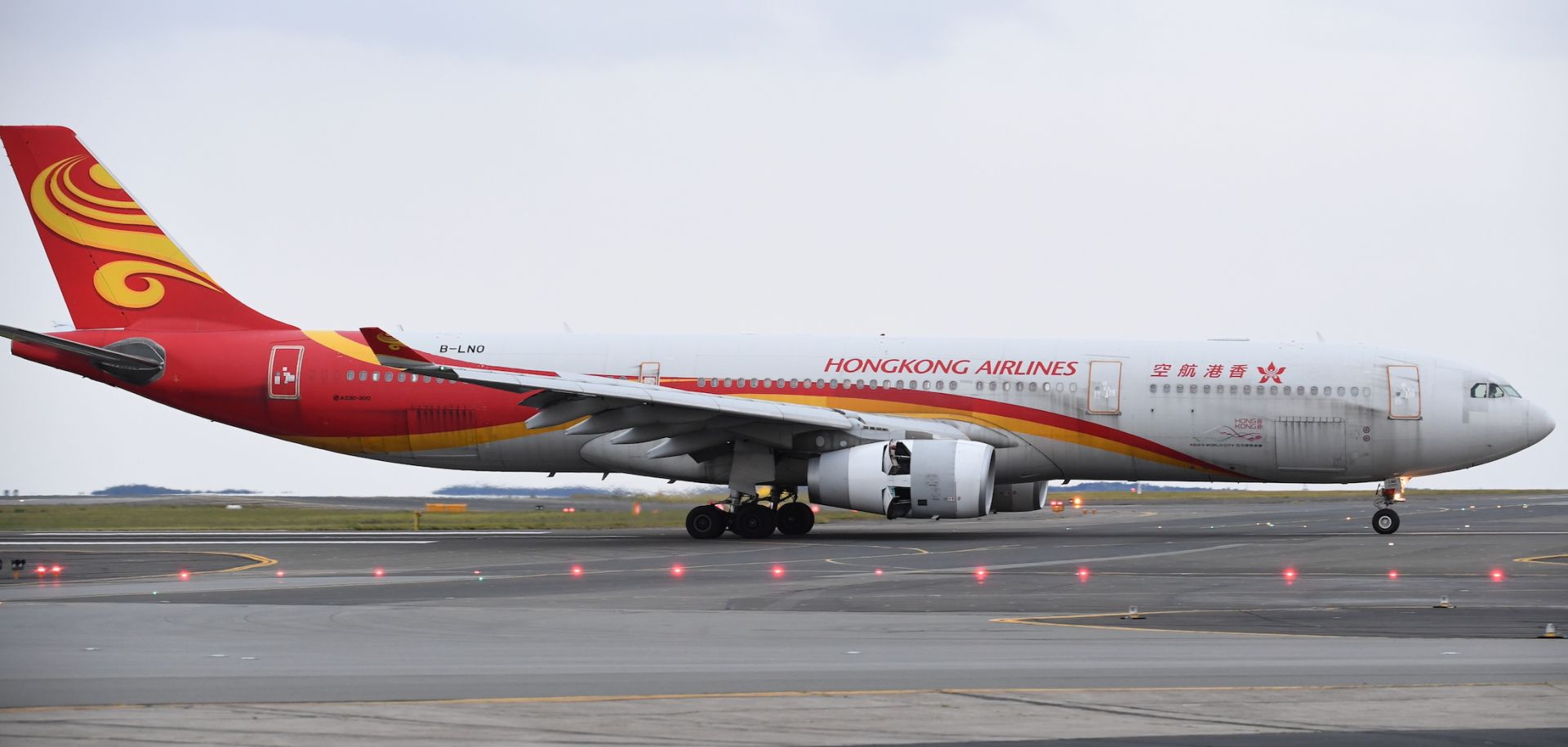 A Hong Kong Airlines plane lands Sept. 1, 2021, at Sydney Kingsford Smith Airport.