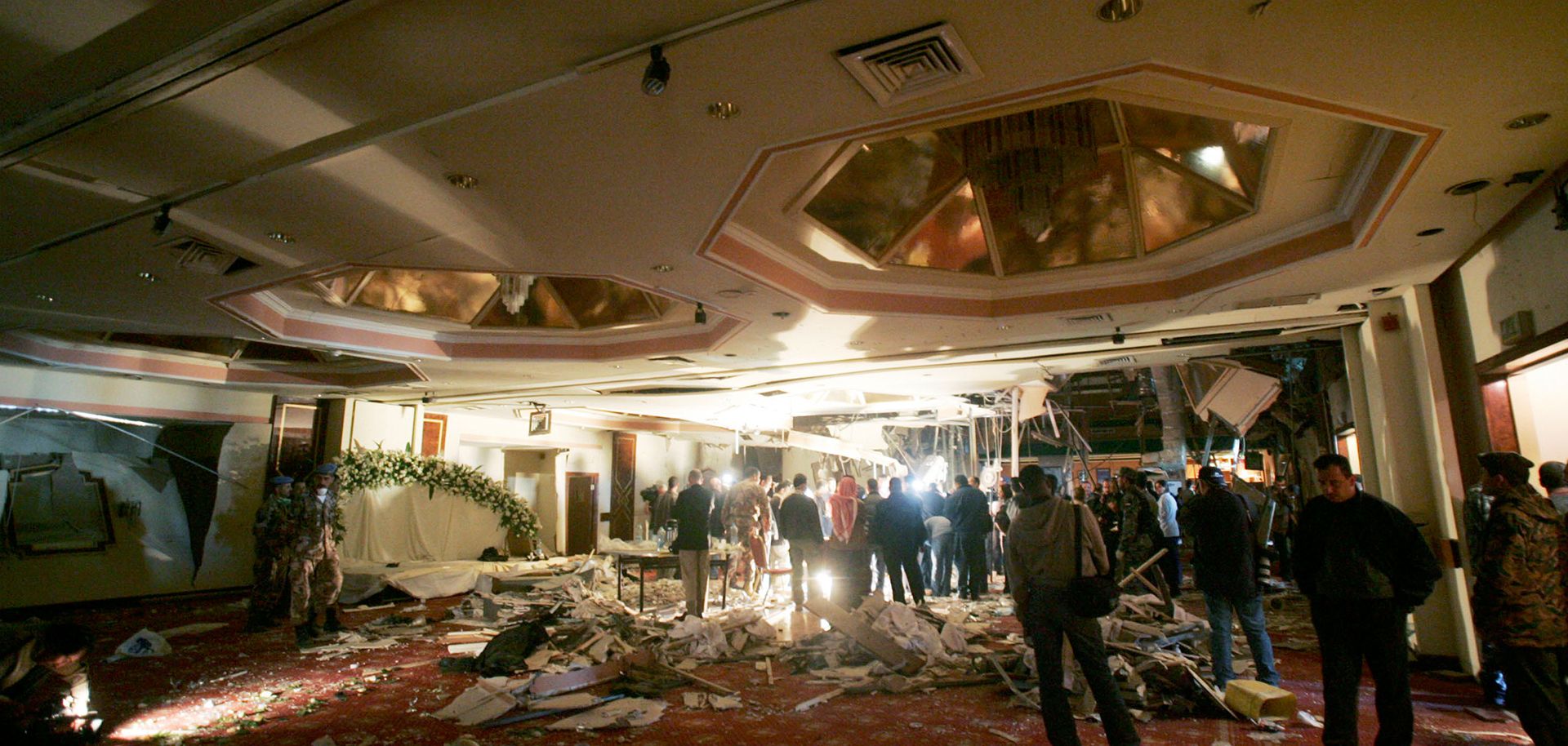 Jordanian policemen stand inside the Radisson SAS hotel, where a wedding party was being held when a bomb claimed by al Qaeda exploded, Nov. 10, 2005 in Amman, Jordan.