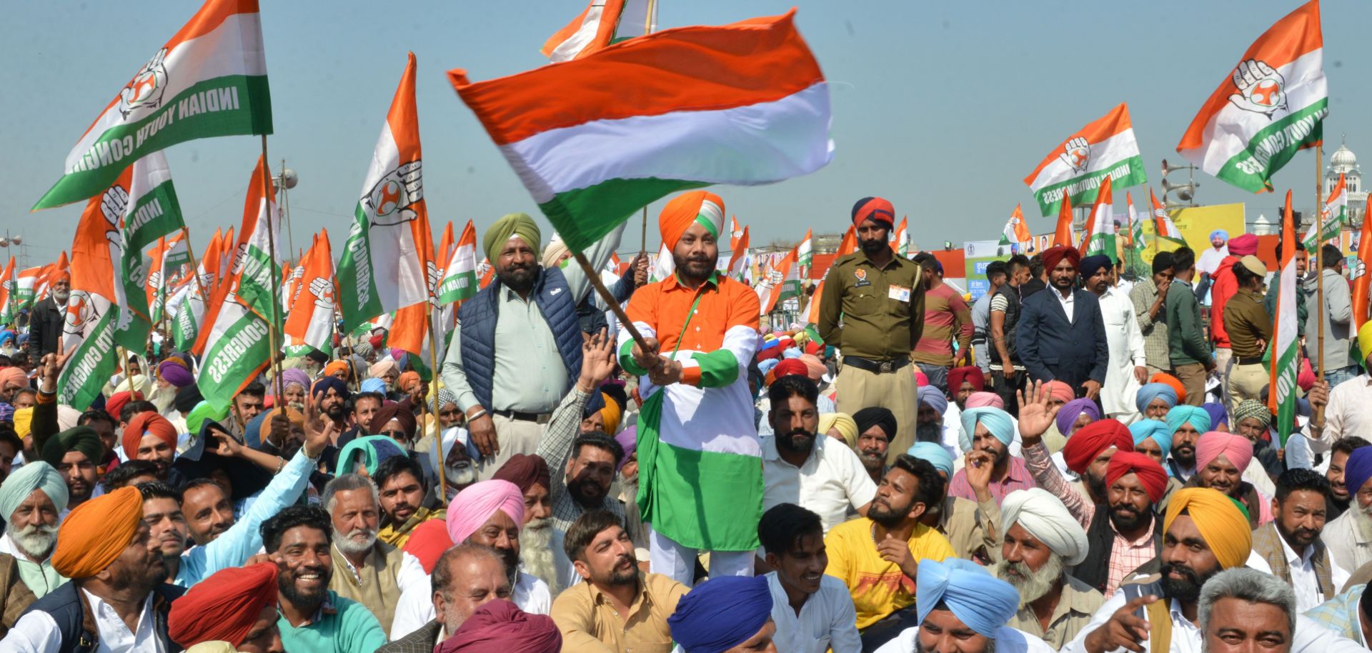 Supporters hold up flags in support of the Indian National Congress (INC) party during the launch of the party's campaign in Punjab ahead of India’s upcoming elections.