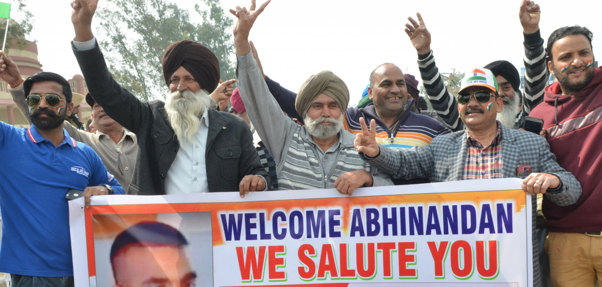 Indians wait for Pakistani officials to hand over a captured Indian pilot at the border crossing near Wagah, Pakistan, on March 1, 2019.