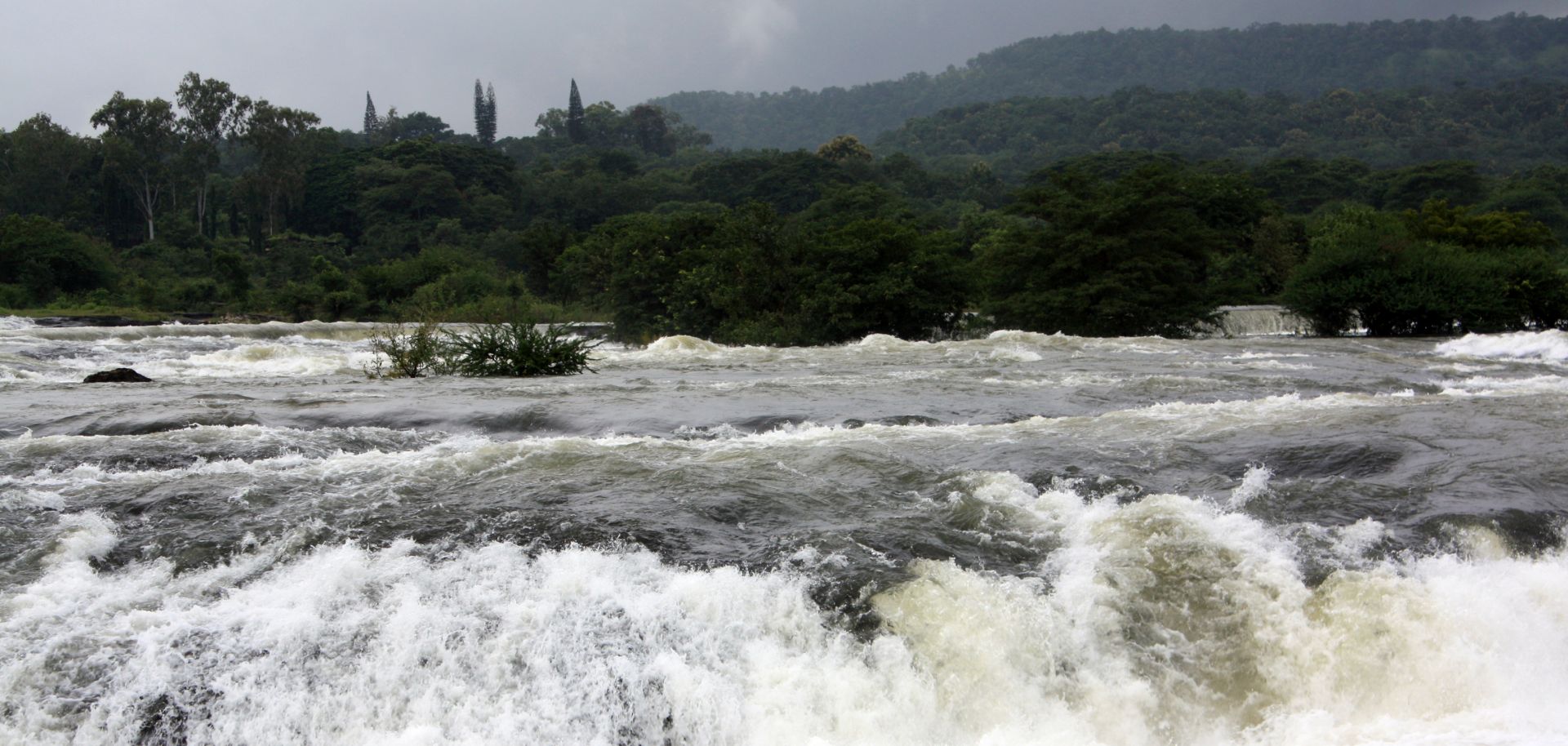 A background with a view of gushing water during recent floods in India.