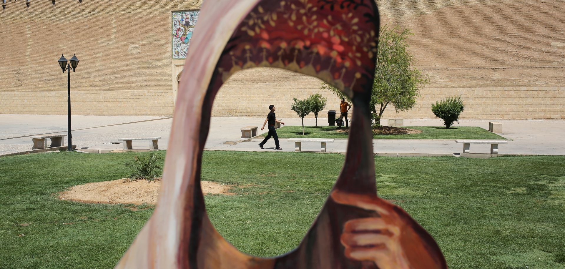 A cutout without a face stands in Karim Khan Castle in Shiraz, Iran. 