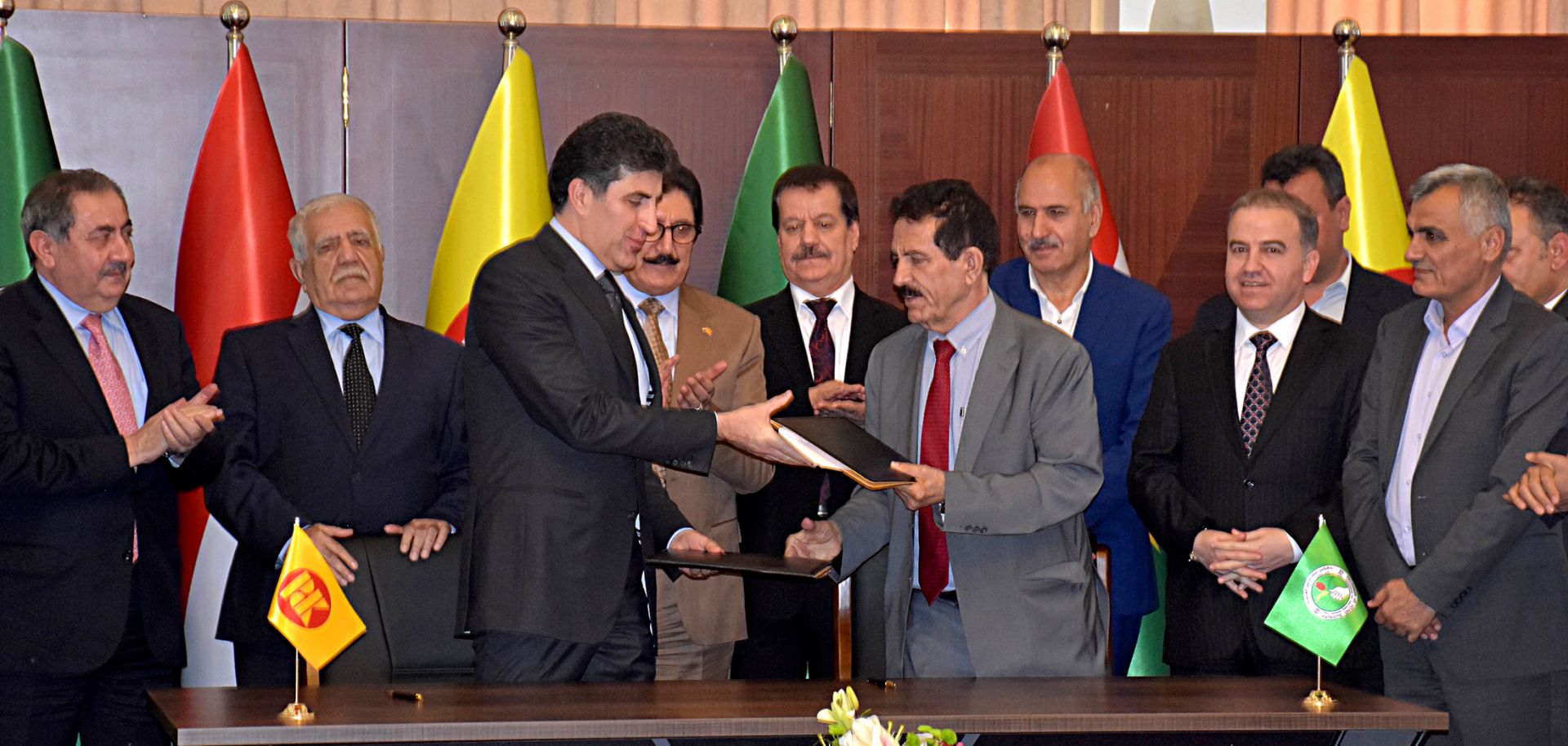 Kurdish officials attend a signing ceremony in Suleimaniyah, Iraq, on May 5, 2019.