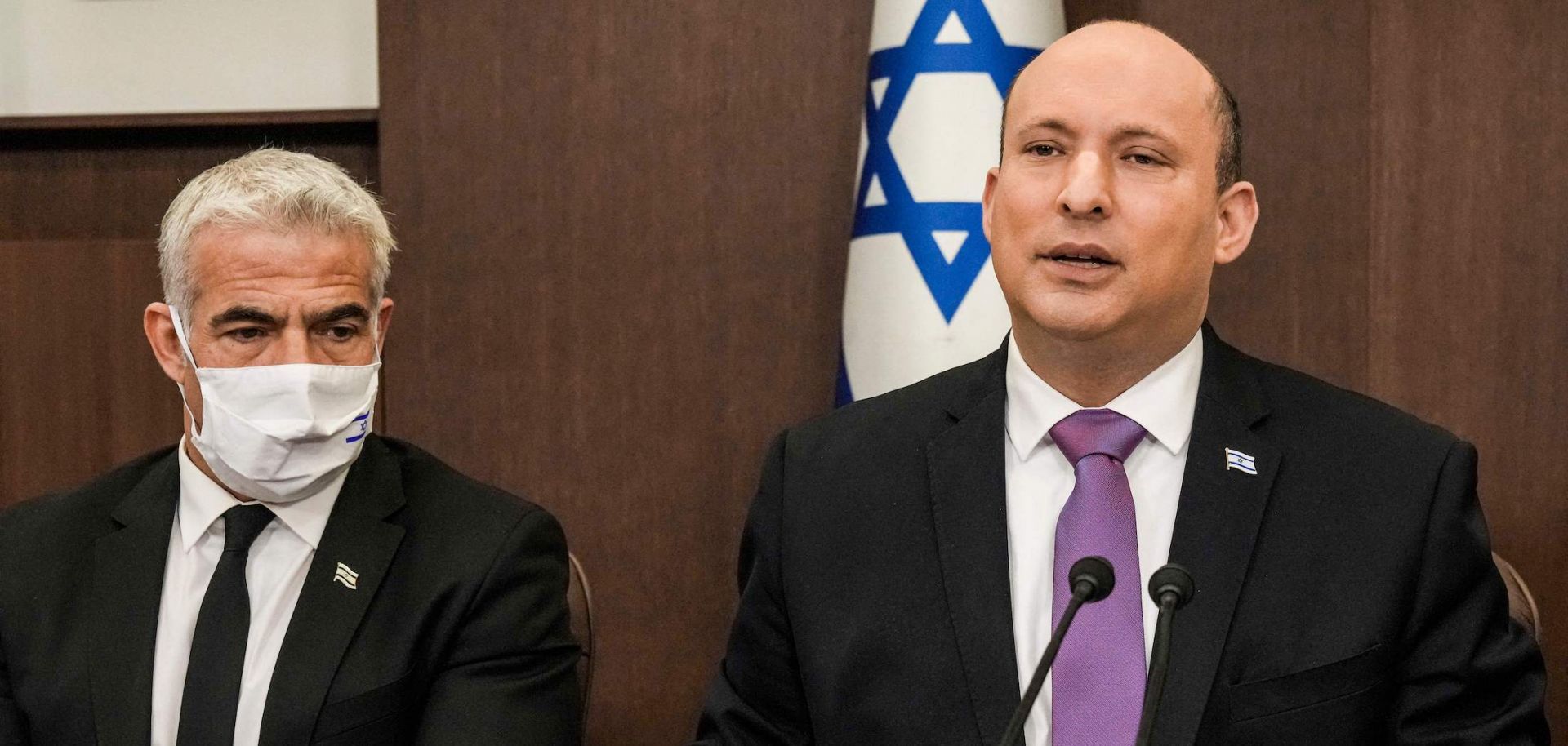 Israeli Prime Minister Naftali Bennett (R) and Foreign Minister Yair Lapid on Feb. 20, 2022, in Jerusalem.