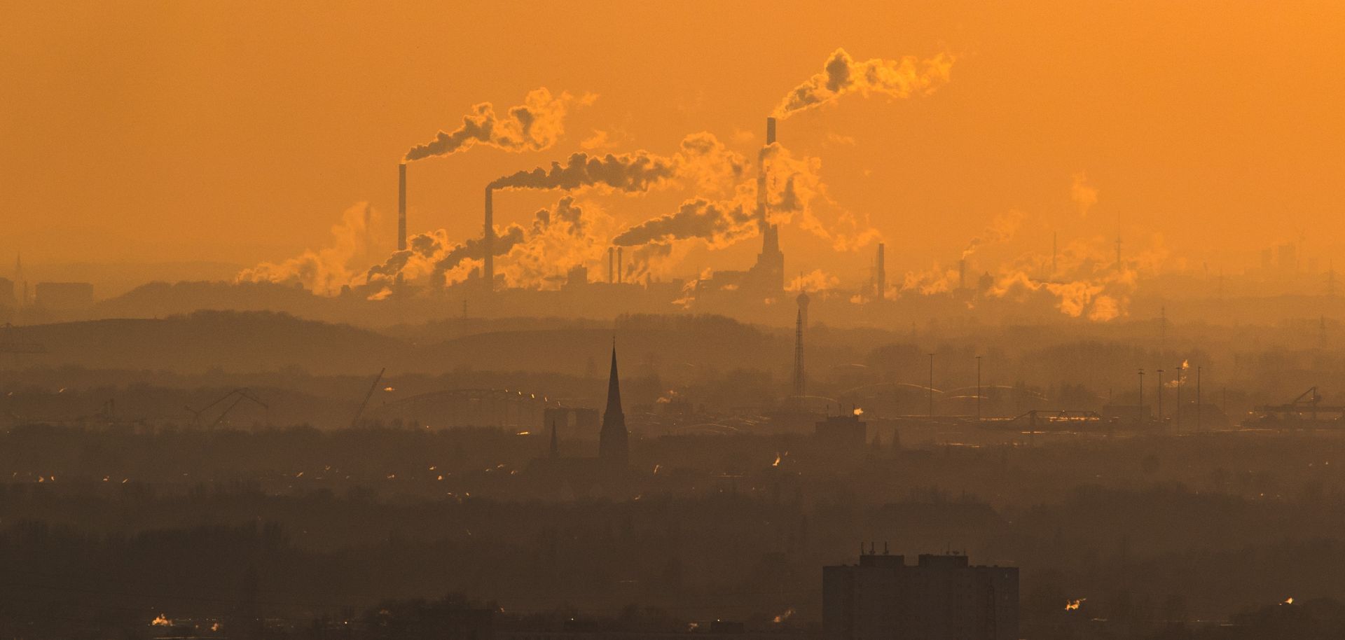 Exhaust rises from plants in Oberhausen, Germany.