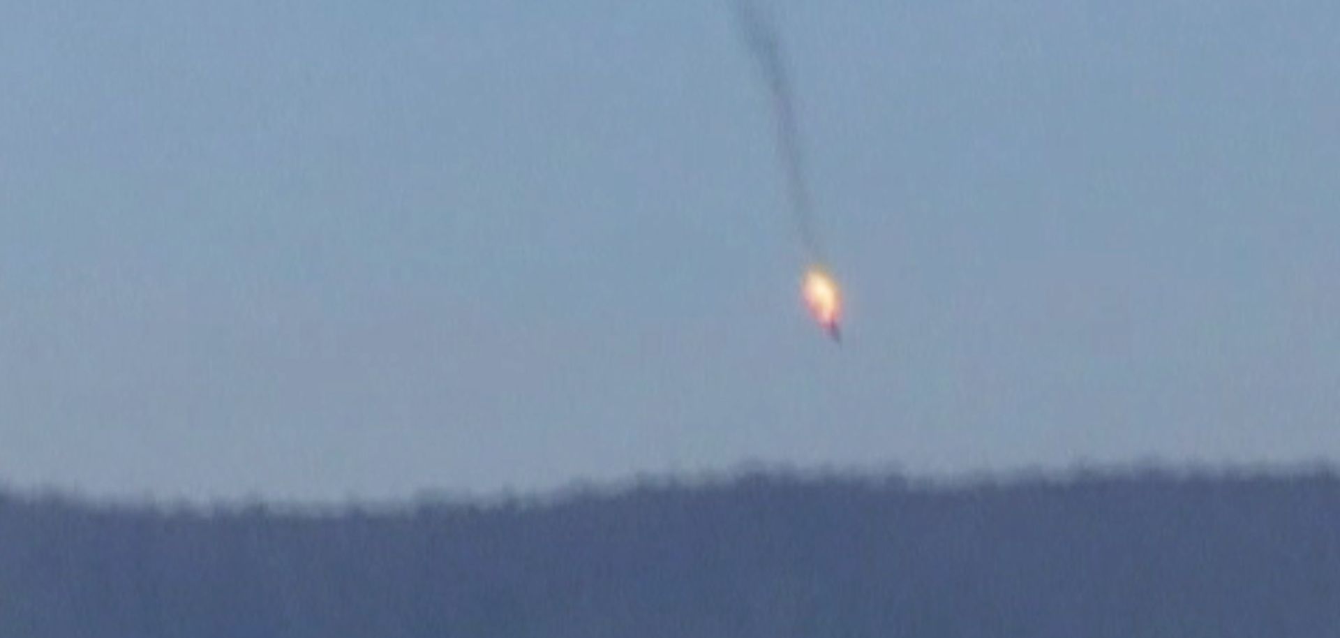 A video still of a Russian Su-24 fighter jet shot down by two Turkish F-16s on Nov. 24.