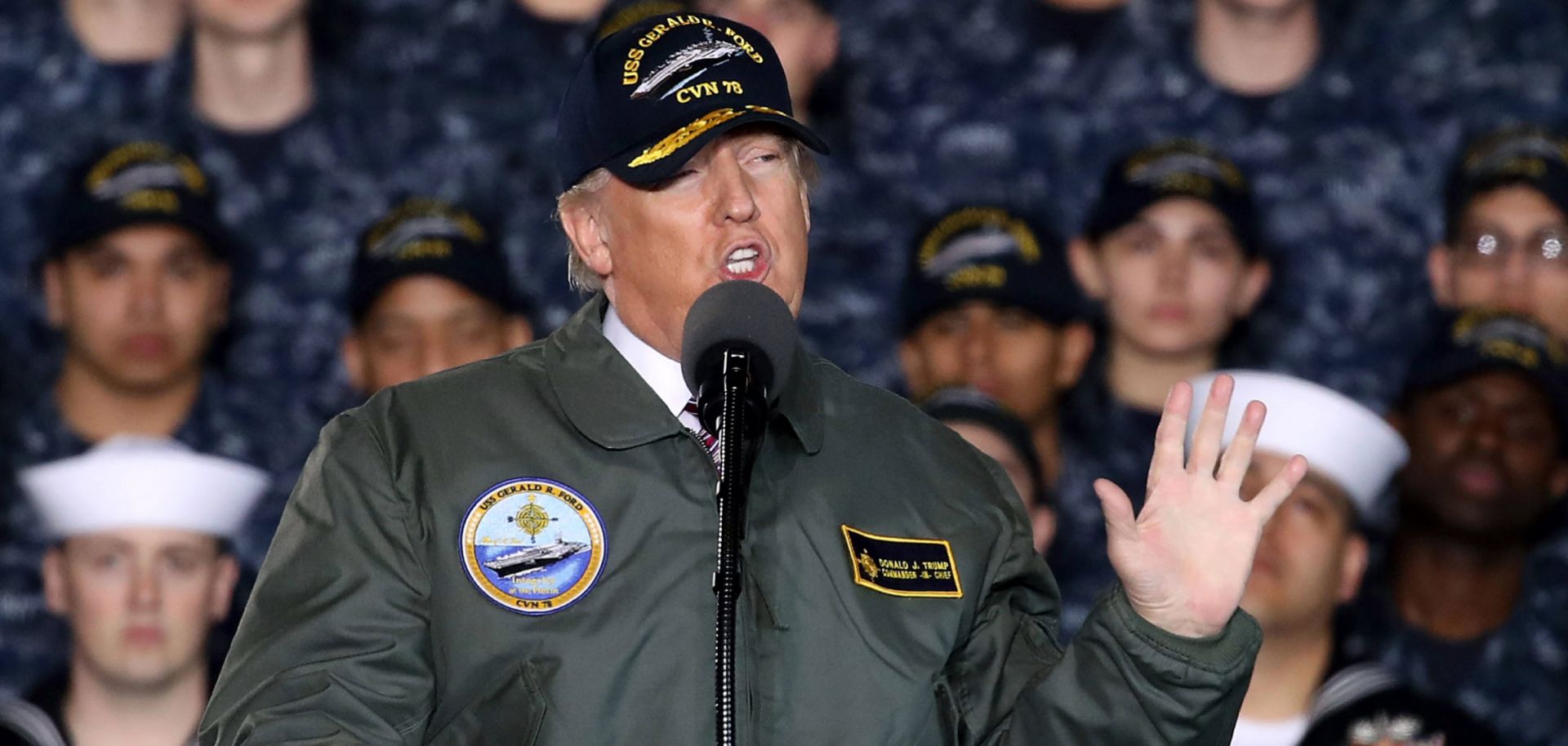 U.S. President Donald Trump (pictured speaking to U.S. Navy personnel and shipyard workers on board the USS Gerald R. Ford) is considering military options in Syria following an April 4 chemical weapons attack in Idlib province.