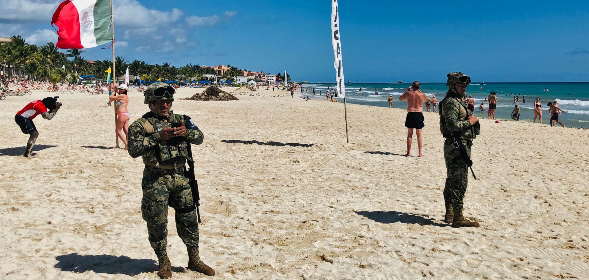 Mexican marines patrol the beach of Playacar, near the seaside tourist resort of Playa del Carmen, Quintana Roo State, on Feb. 14, 2019.