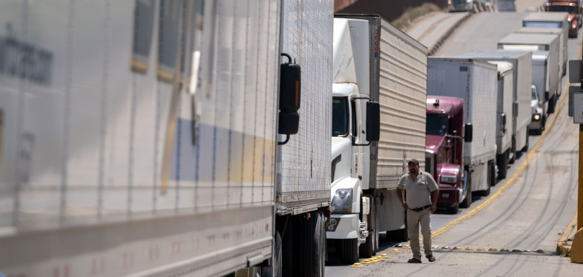 Cargo trucks line up a the Otay commercial crossing in Tijuana, Baja California, in Mexico.