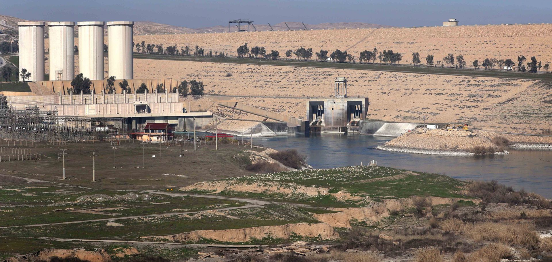 A picture taken on February 1, 2016, shows the Mosul Dam on the Tigris River, around 50 kilometres north of the Iraqi city of Mosul. The United States is monitoring Iraq's largest dam for signs of further deterioration that could point to an impending catastrophic collapse, US army officers said on January 28, 2016. The Islamic State (IS) jihadist group seized the Mosul Dam briefly in 2014, leading to a lapse in maintenance that weakened an already flawed structure, and Baghdad is seeking a company to make