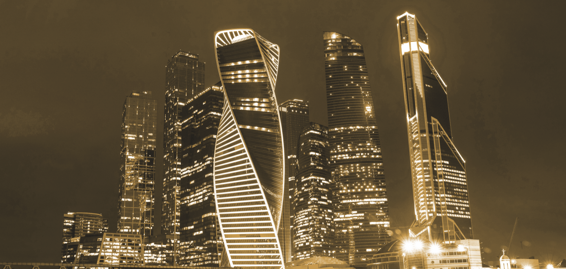 Moscow's skyline gleams against the night sky.