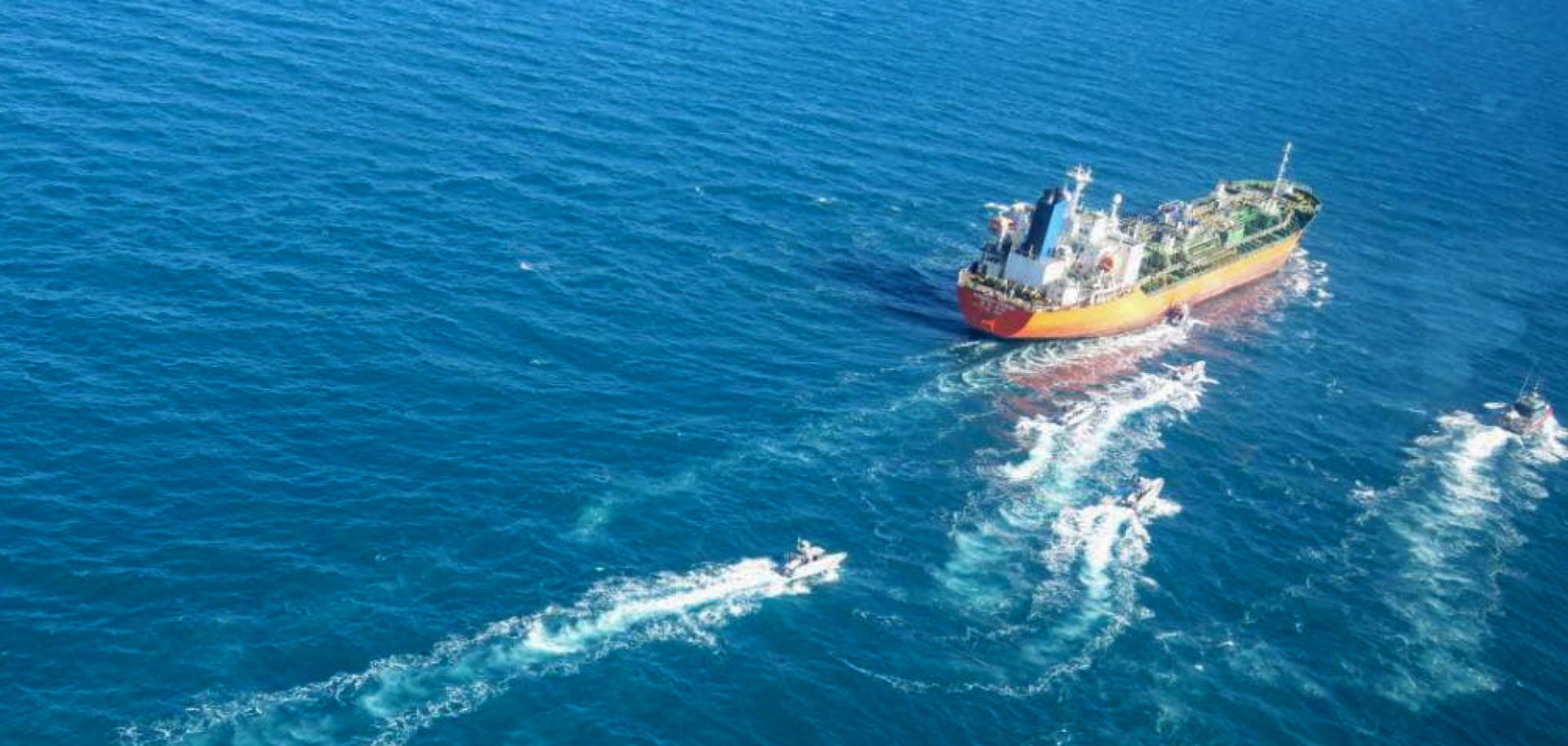 A South Korean-flagged tanker is escorted in the Persian Gulf after being seized by the Iranian navy on Jan. 4, 2021. 