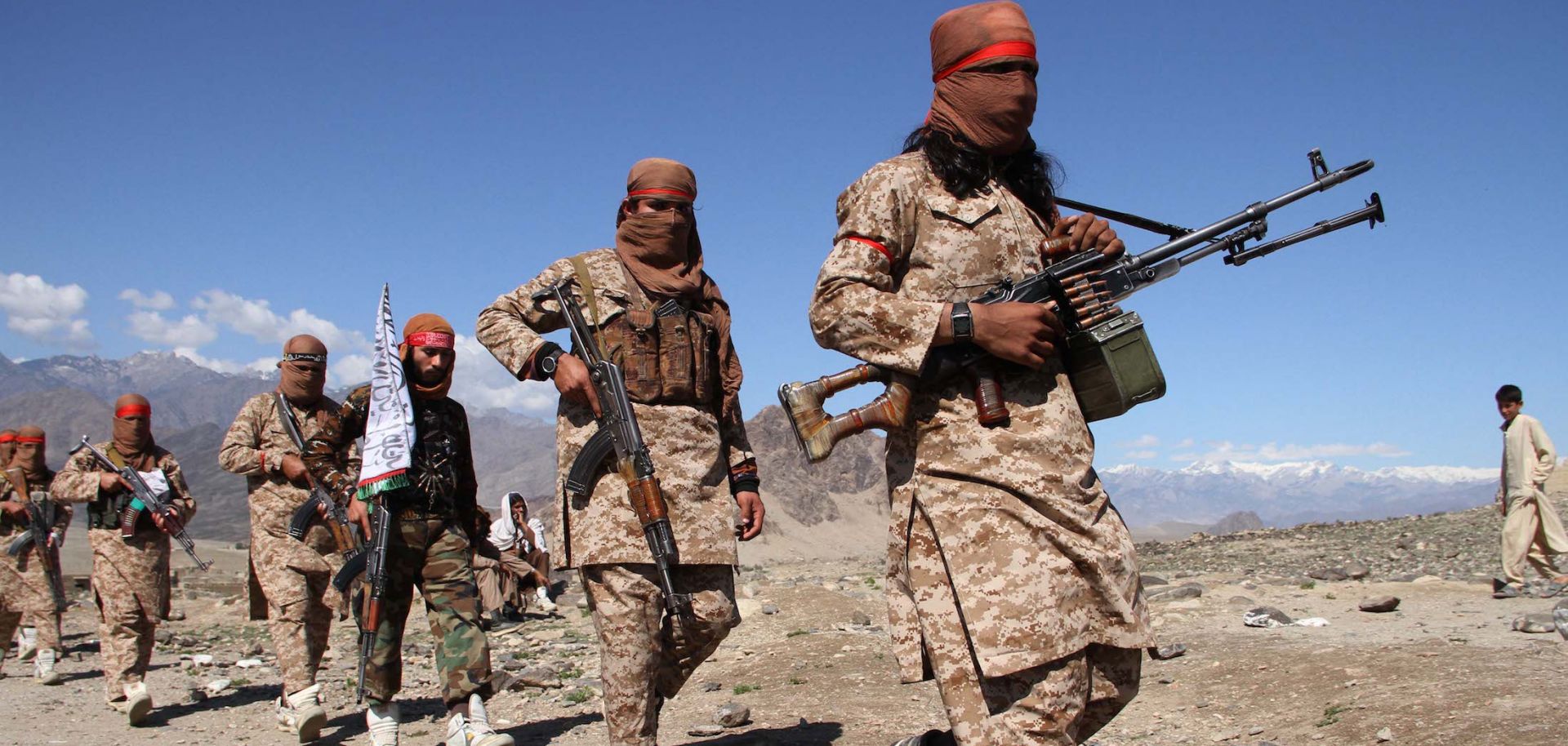 Taliban fighters attend a gathering in Afghanistan's Laghman province on March 2, 2020, to celebrate the peace deal recently signed between the United States and the Taliban.